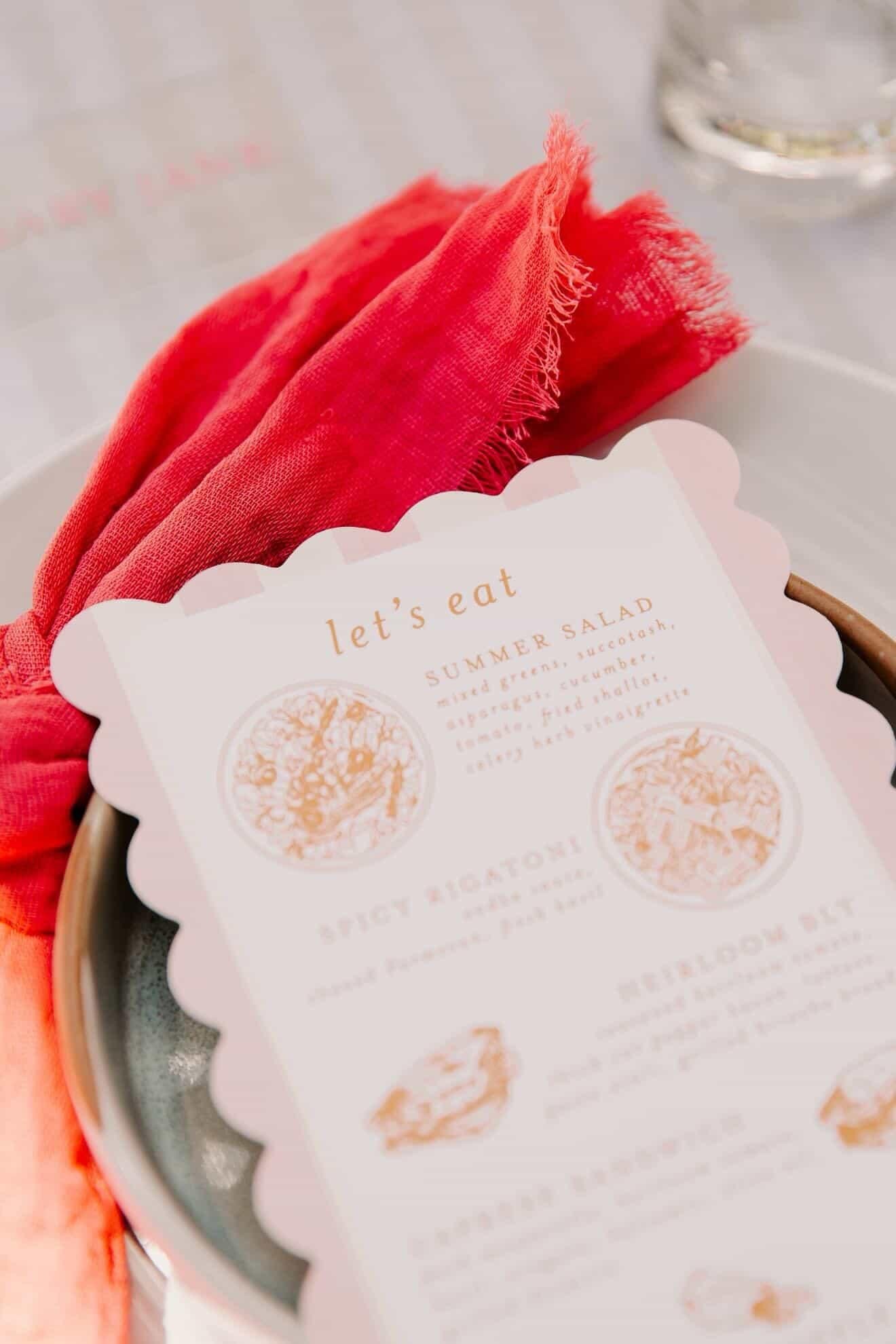custom illustrated menu with blush and white striped backing