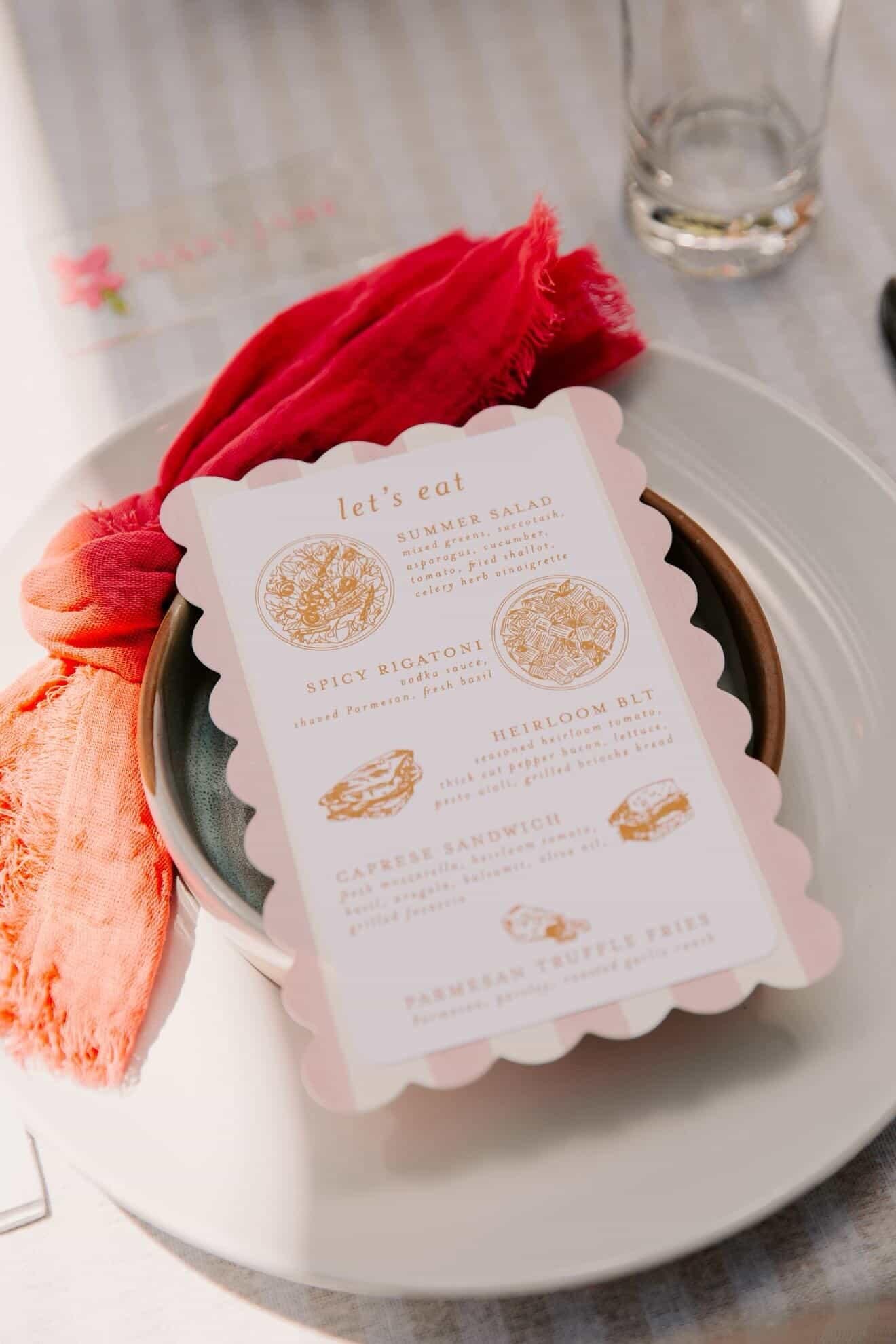 custom illustrated menu with blush and white striped backing