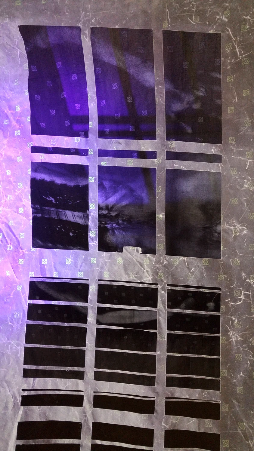 "“Healing House III,” (Detail) Beeswax, silk, silkscreen, black light, 60” x 75” x 25,” 2018