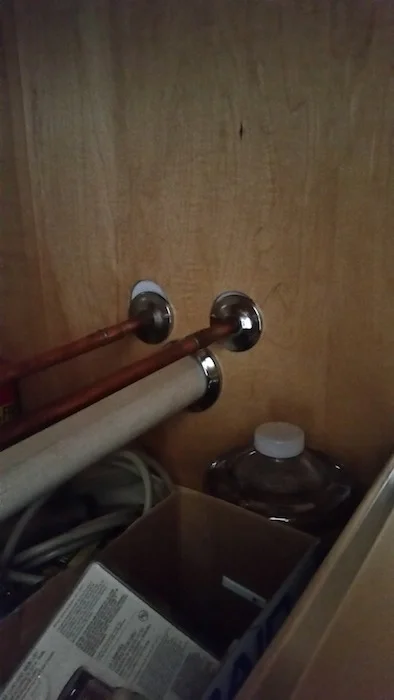 These escutcheons aren't even lined up properly to close the gap. Not an HM approved job.