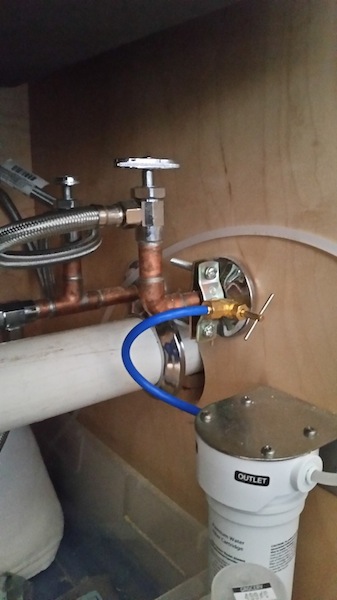 The escutcheon is the metal flange meant to close the gap between pipe and wall. But note the gap. 