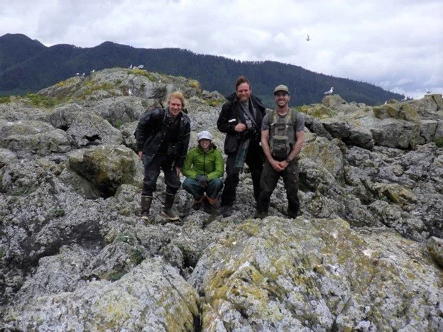 Figure 3: The Black Oystercatcher and Glaucous-winged Gull crew poses on Kingsway Rock. Pictured left to right is Matt Peck, Klare Yakabuski, Andrew Jacobs, and Jesse Beaubier-Brulotte