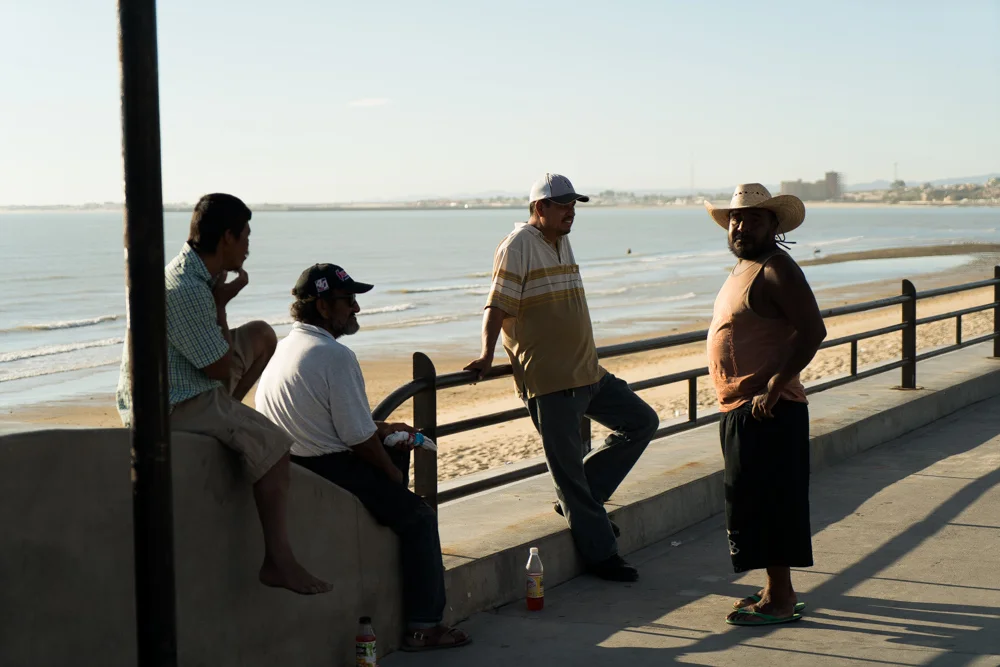 Fishermen waiting for a sport fishing customers in Malikon. Many of the fishermen of San Felipe also engage in illegal fishing for another endangered species called Totoaba. Its swimbladder is smuggled to China and fetches thousands of Dollars on the black market. It is said that most of the fisherman on the upper Gulf is part of this illegal business. © Emre Caylak