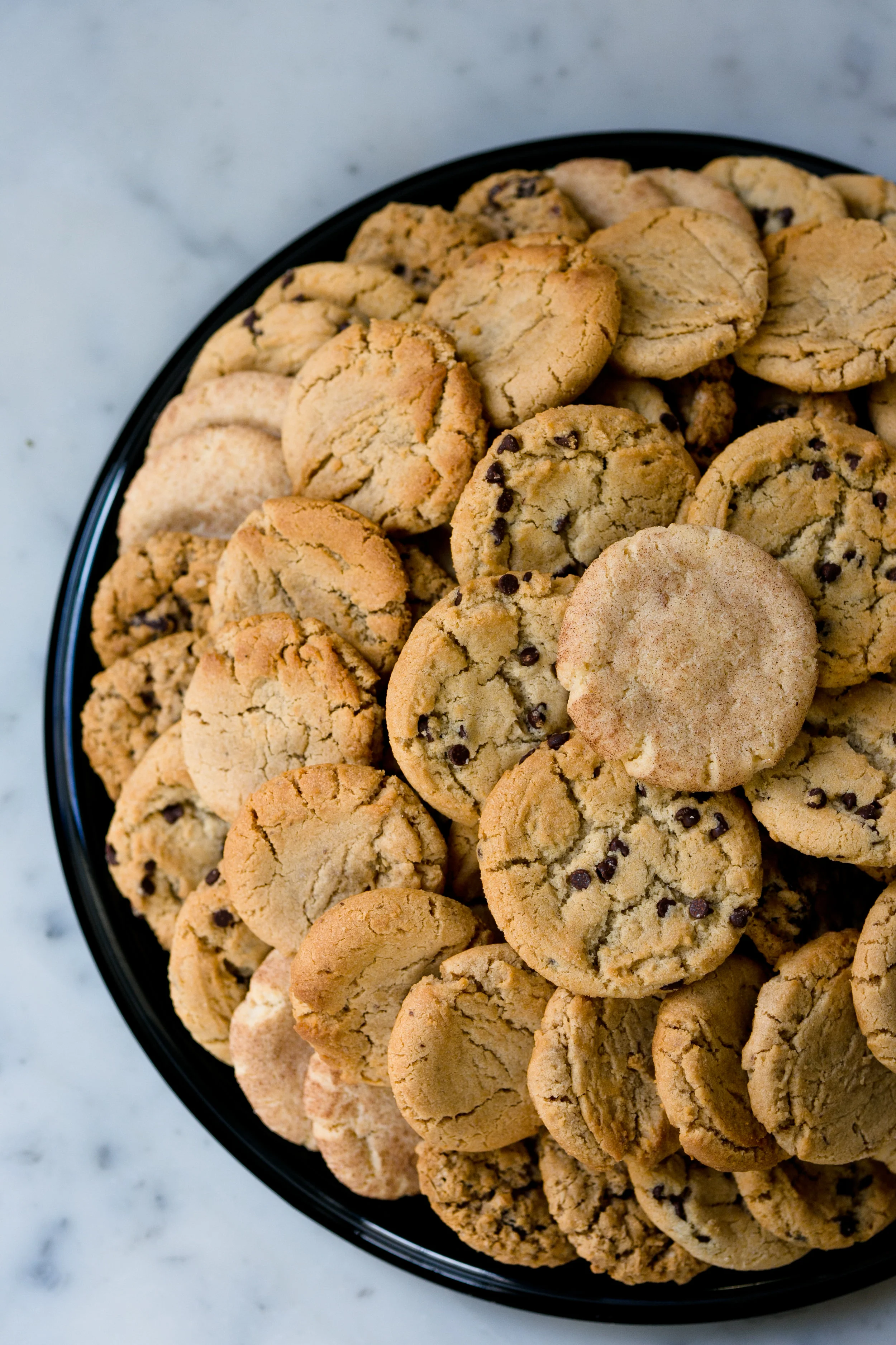 Cookie tray, $35/30 cookies, $70/60 cookies Our choice of an assortment of 3-4 different flavors.
