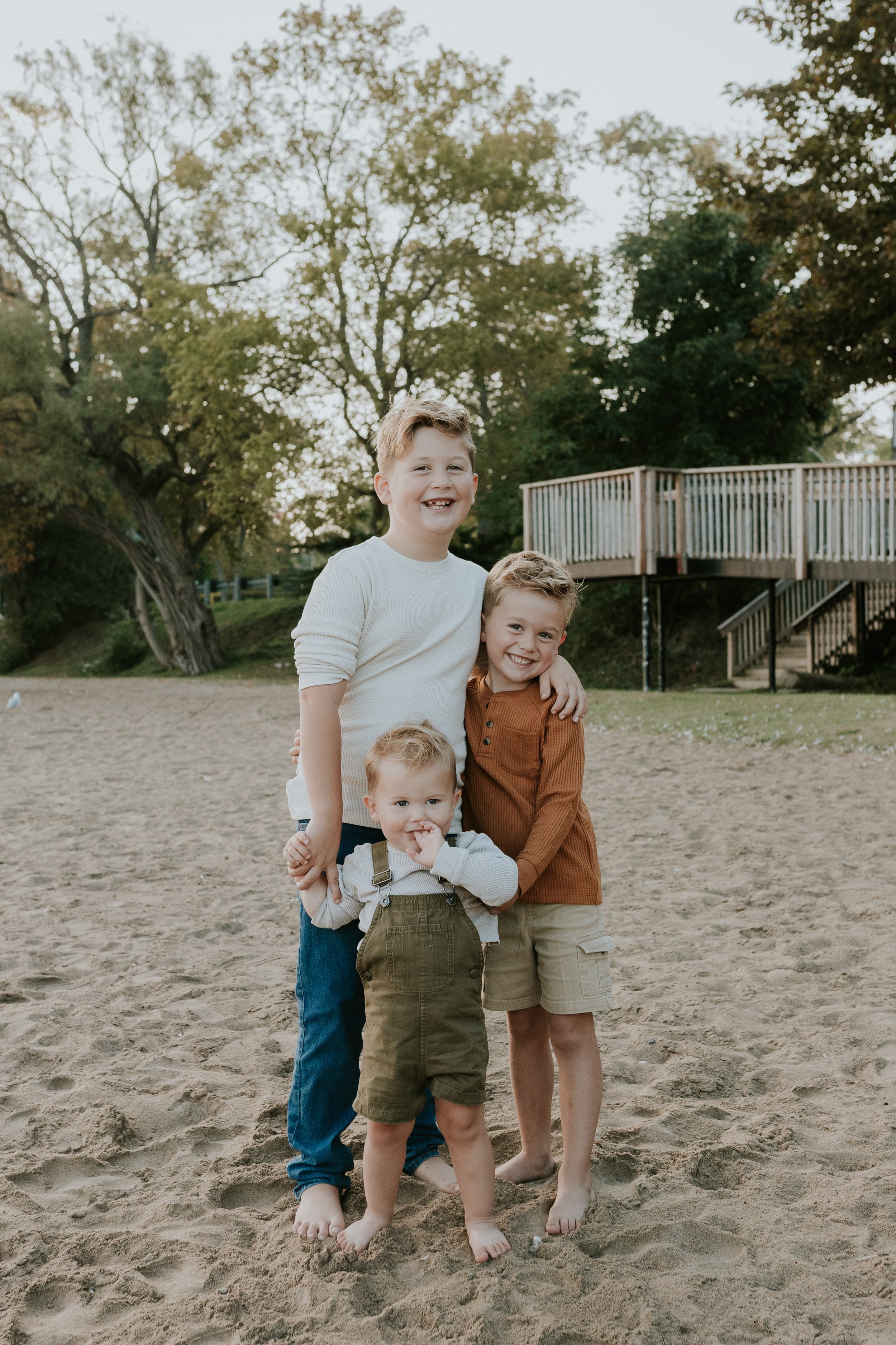 morning sunrise mini photo session with brothers at de la salle beach in georgina ontario