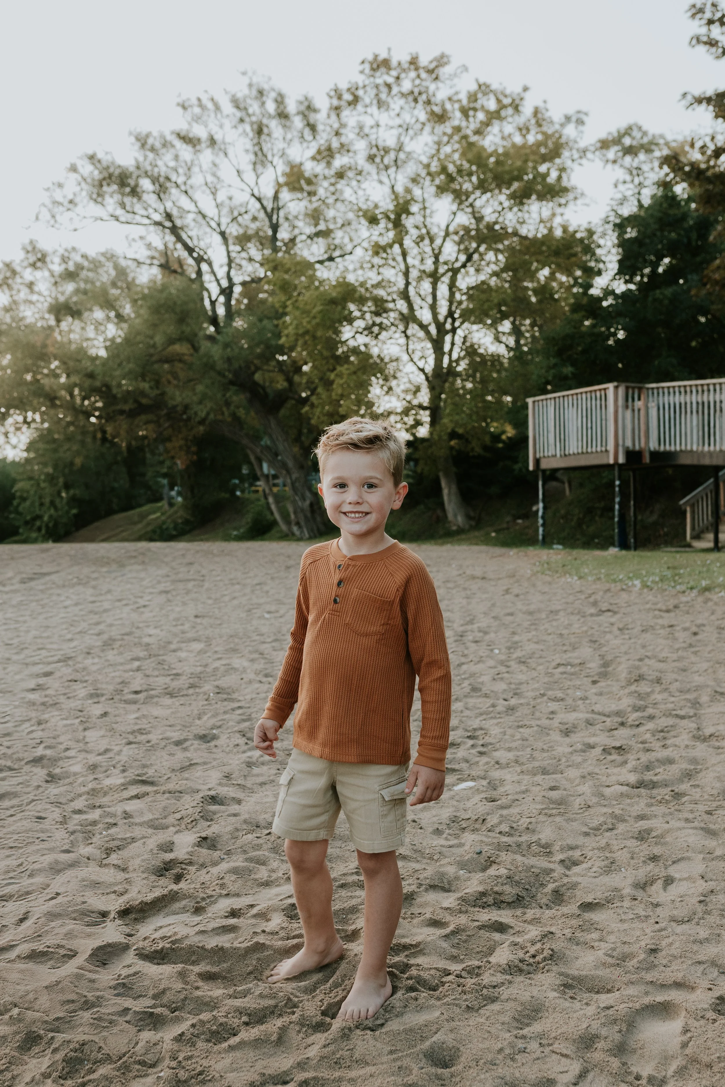 4 year old on de la salle beach family photo shoot at sunsrise in georgina ontario