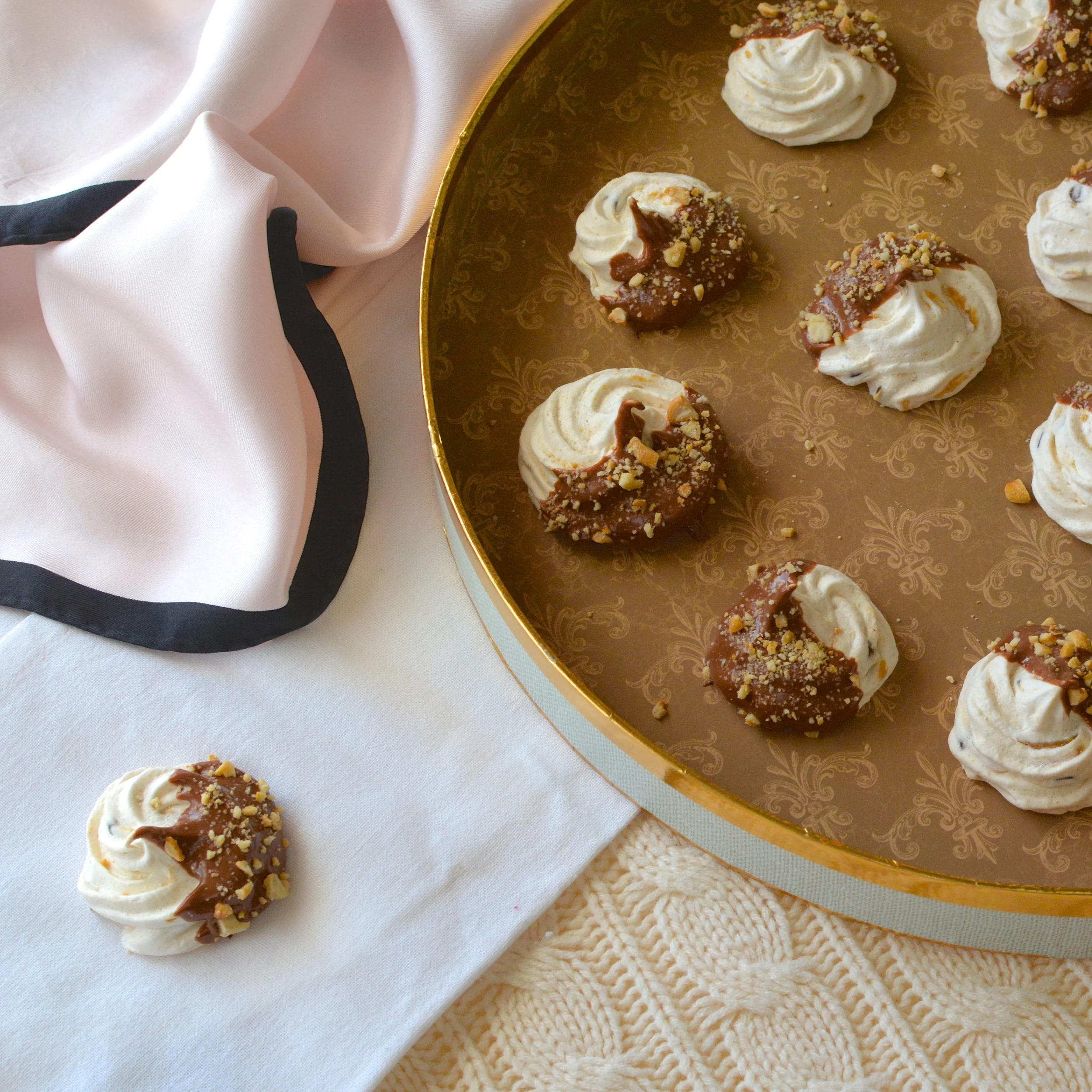 Chocolate Dipped Peanut Butter Meringues with Mini Chocolate Chips and Crushed Peanuts