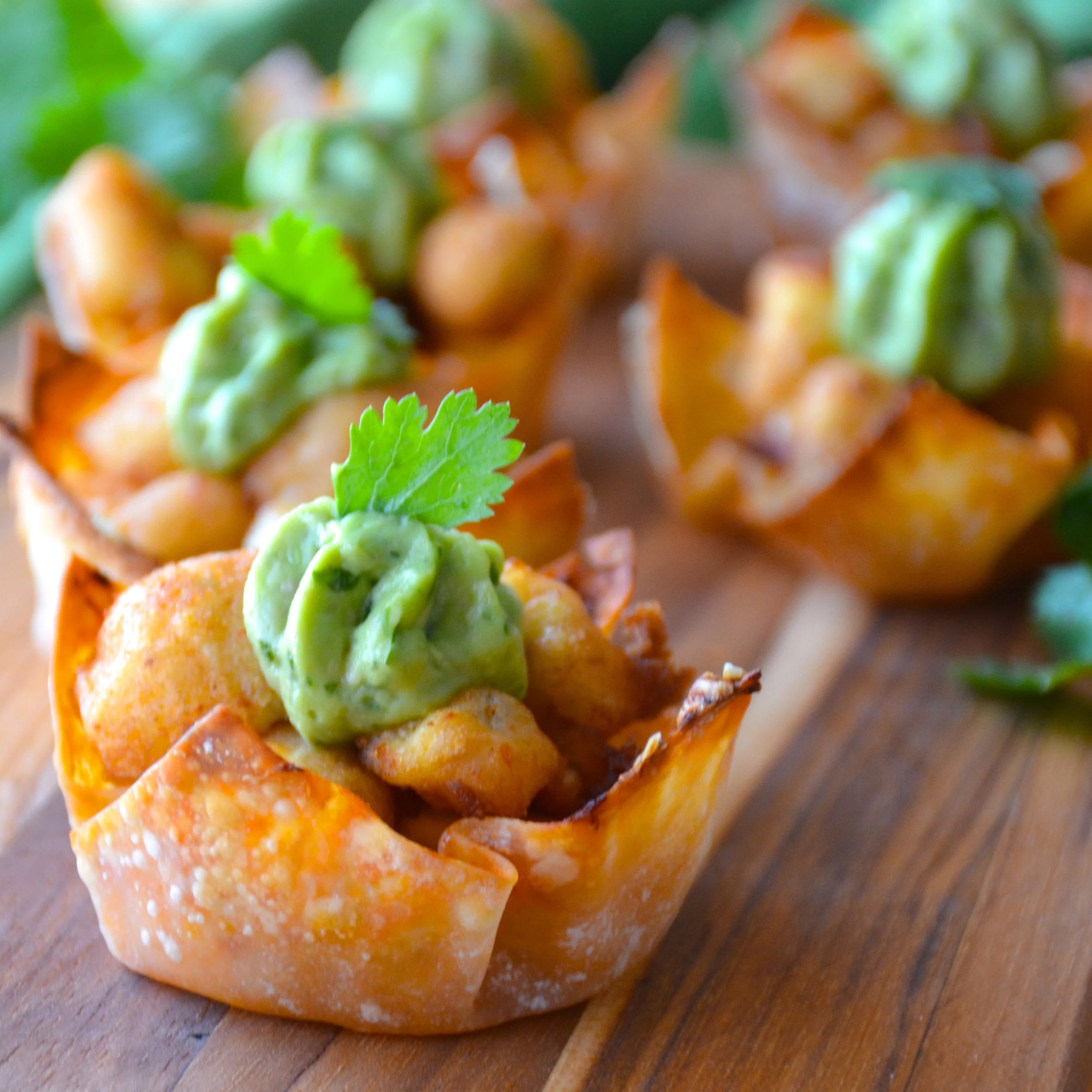 Crispy Cheddar Sriracha Cups with Beer Battered Coconut Lime Tofu and Avocado Cilantro Cream
