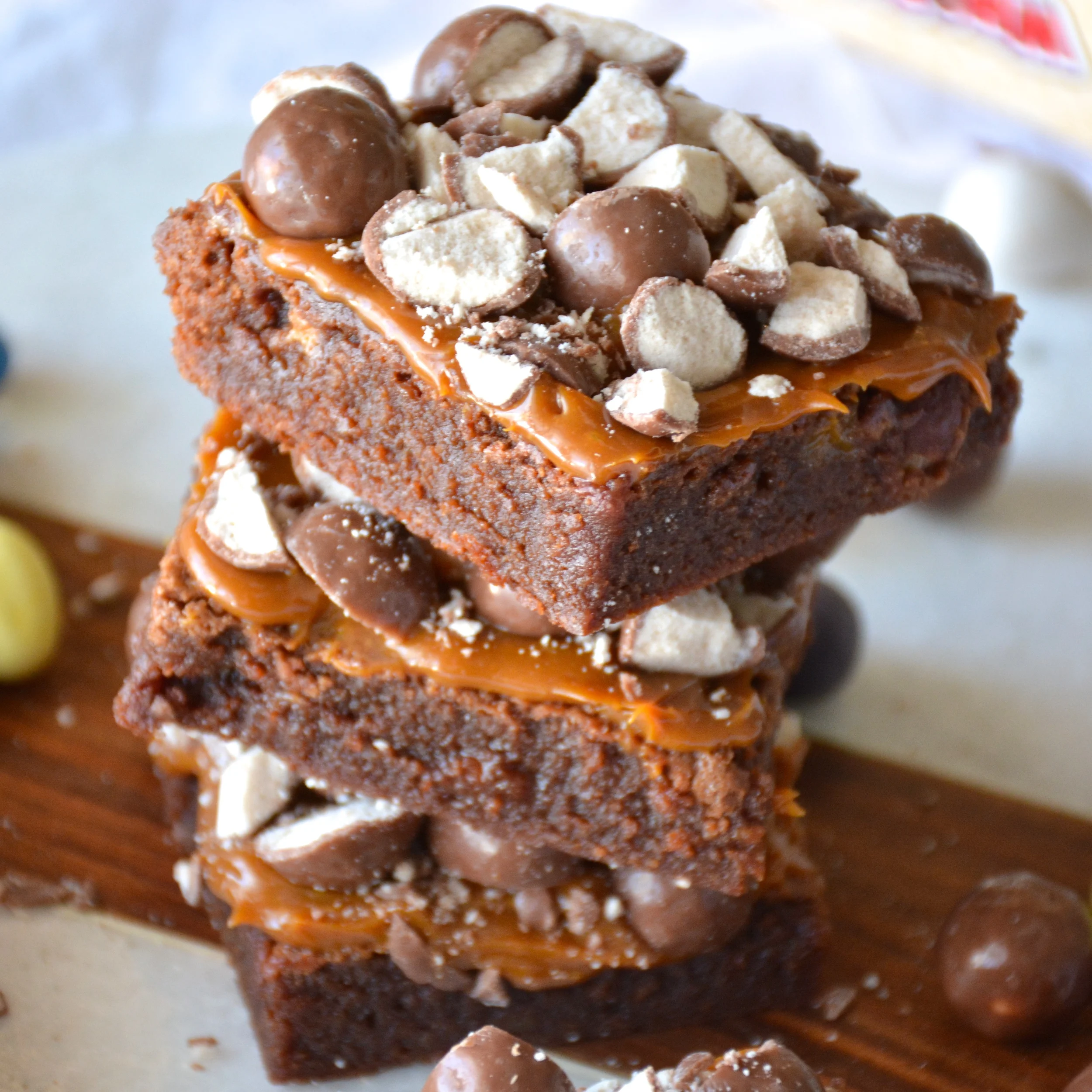 Malted Milk Chocolate Brownies with Salted Dulce de Leche Topping and Crushed Whoppers