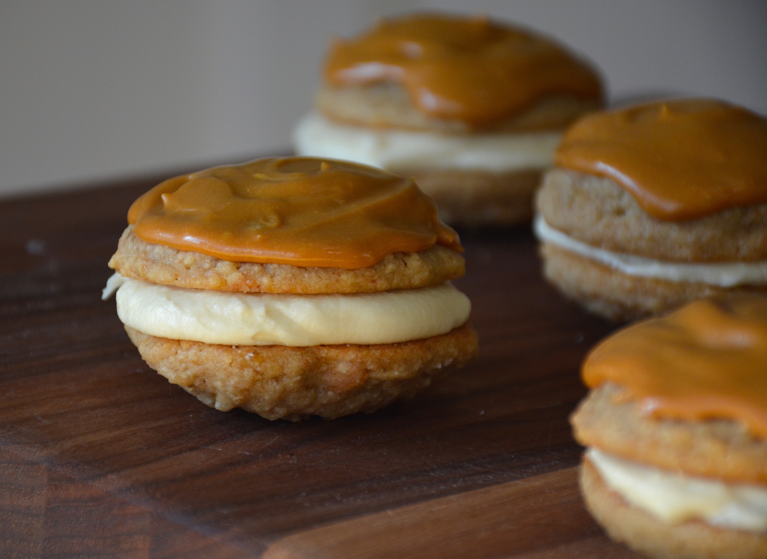 Banoffee Inspired Cookies - Banana Cookies with Vanilla Banana Cream Filling and Dulce de Leche Frosting