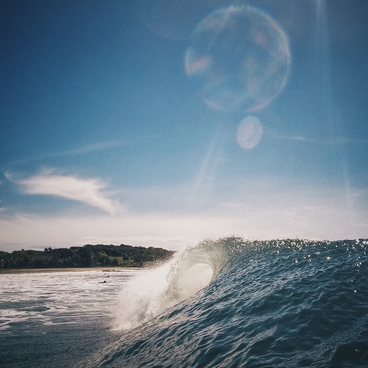 A wave with what looks like a super moon flair 
