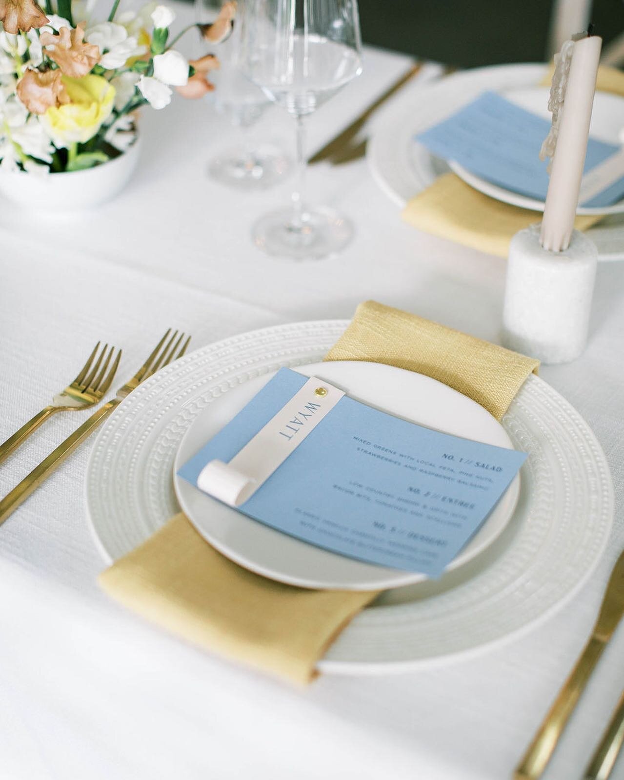 Sending love to our boys in blue tonight with some scroll placecards and brass fasteners, how bout you 💙 #goheelsgoamerica 
⠀⠀⠀⠀⠀⠀⠀⠀⠀
Photography: @jordanmaunder 
Planning + Event Design: @kasteventsandco 
Florals: @wyldeflowers 
Venue: @merrimonwyn