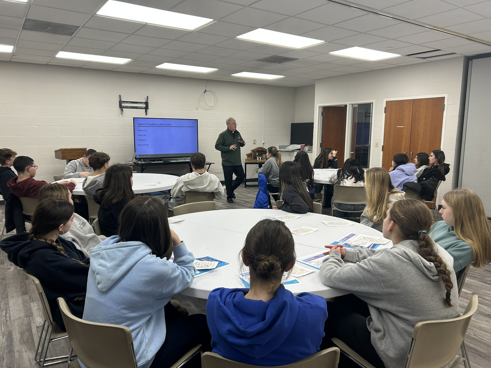 Fr Mike with 9th grade.JPEG