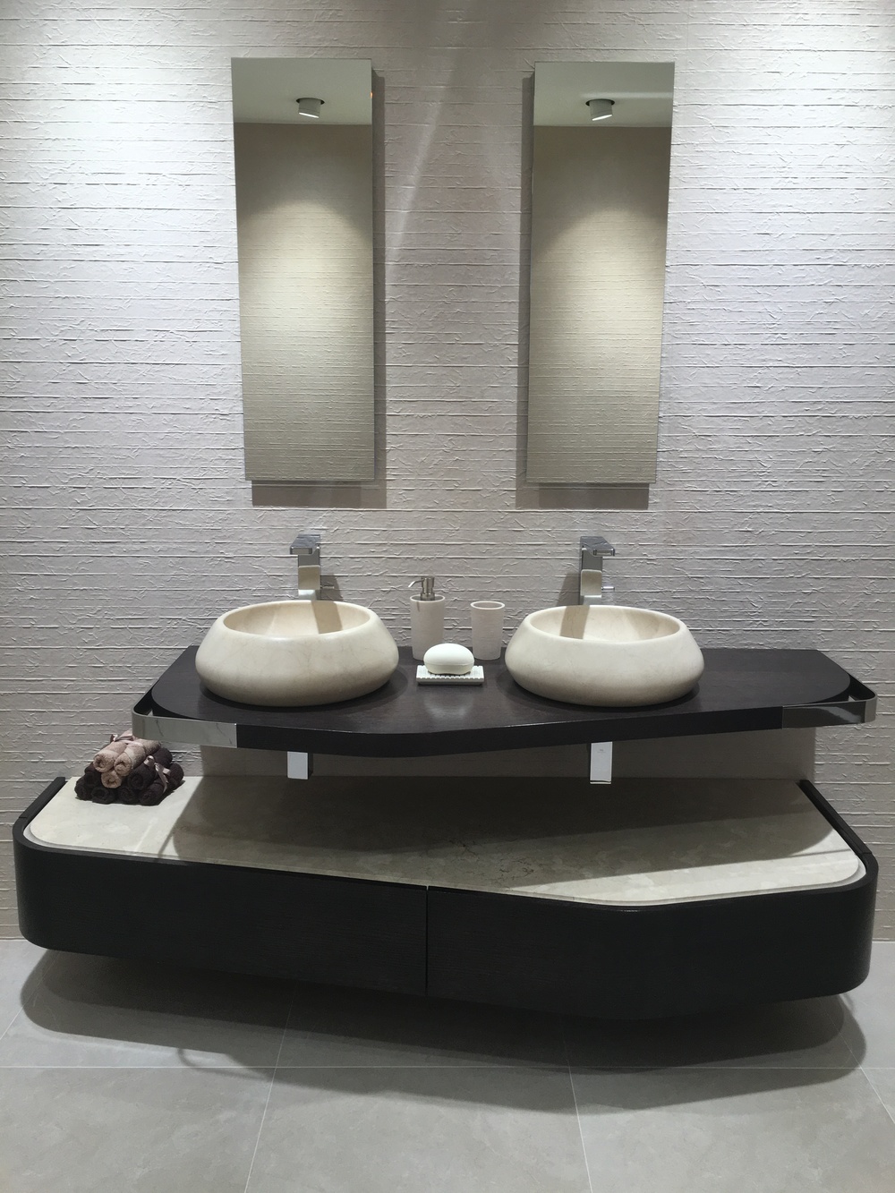 Couple's sinks with asymmetric detail and beautifully shaped bowls
