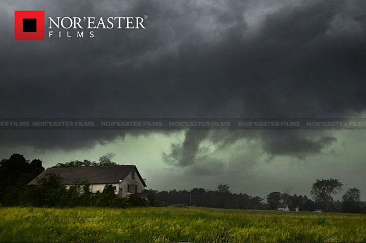 Green sky above an abandoned farmhouse in Halfmoon, New York.
