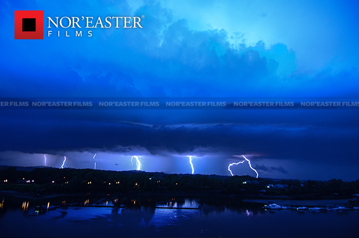Multiple lightning strikes over the Hudson River at Troy, New York.