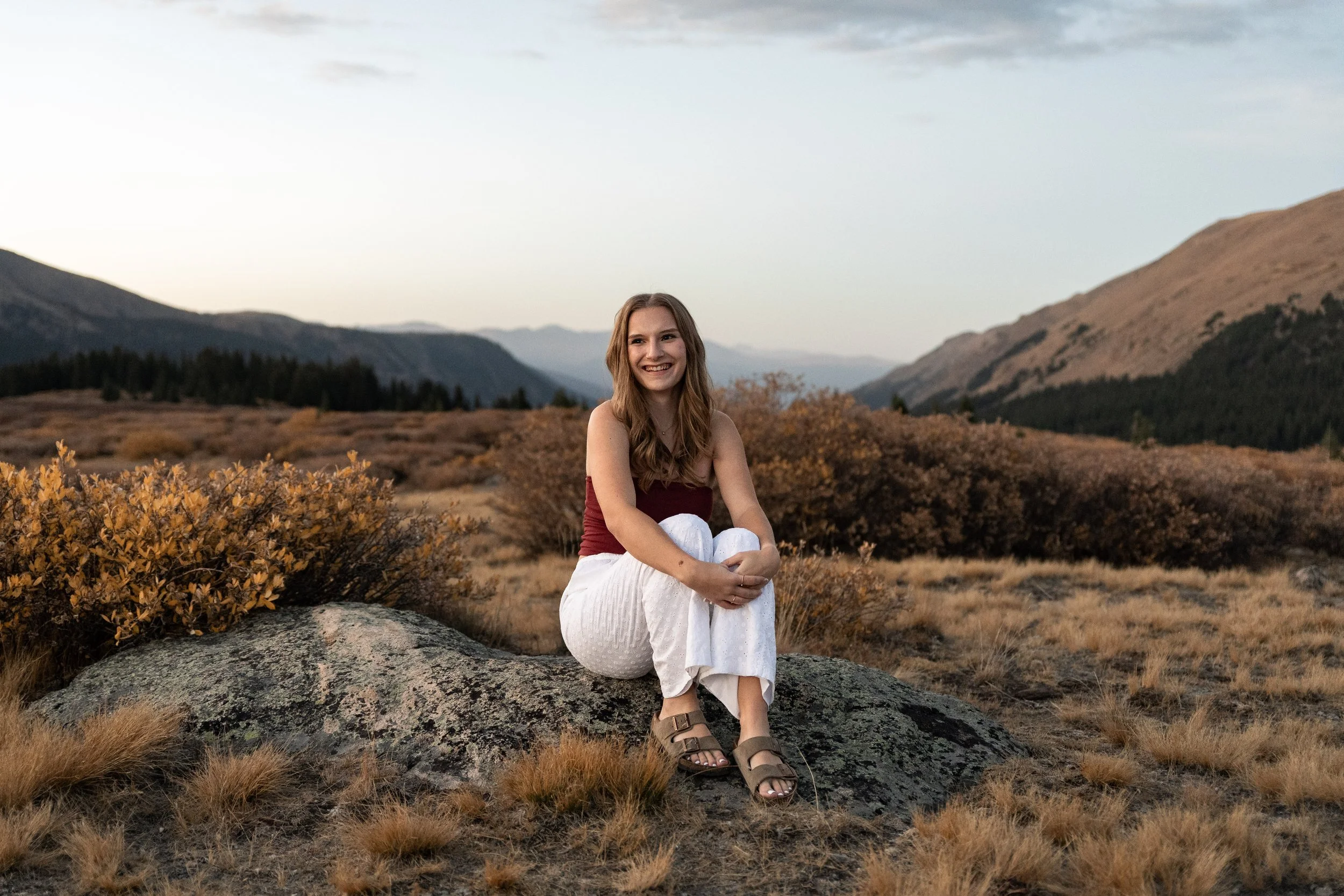 young woman senior portraits high school photoshoot guanella pass colorado