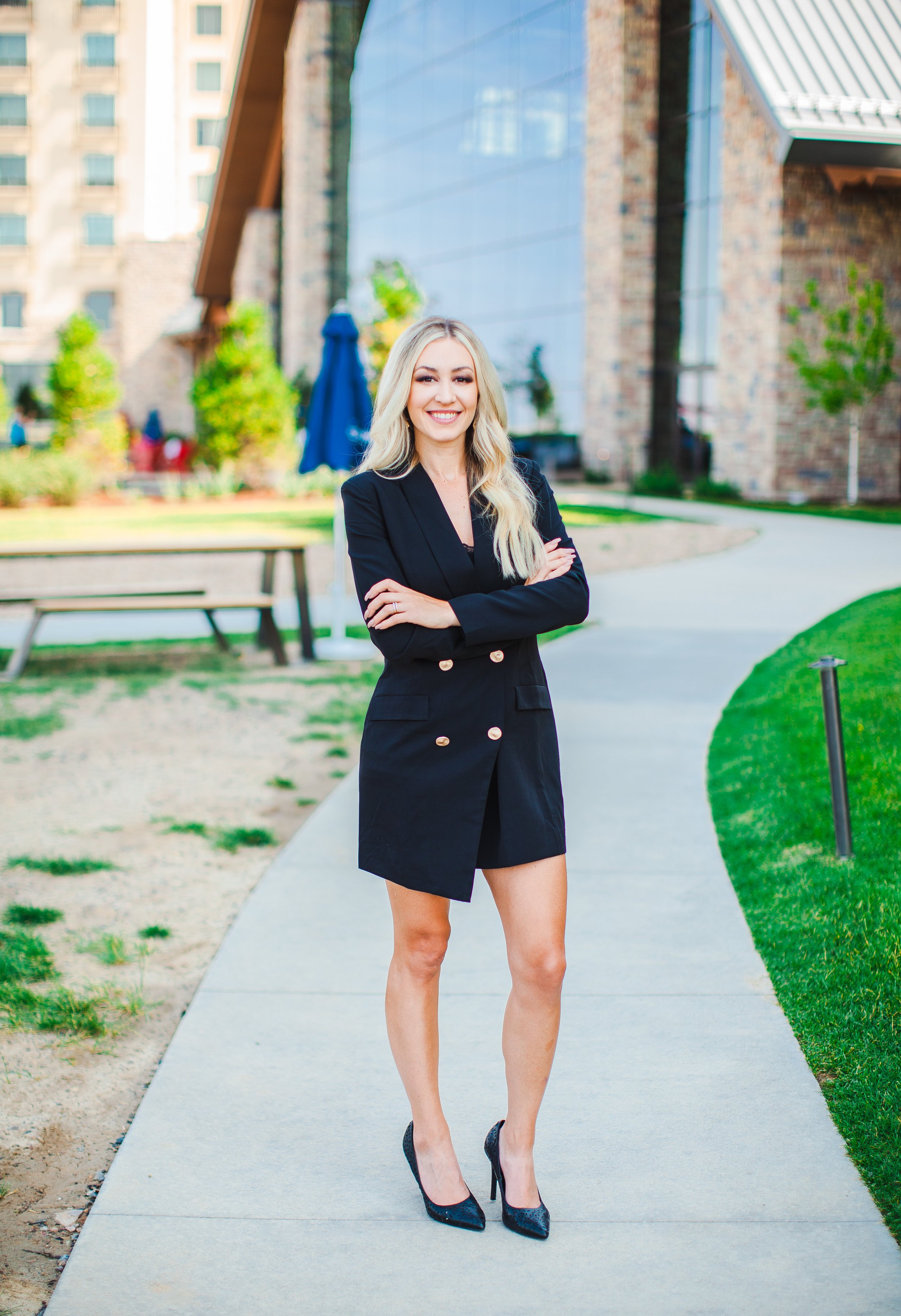 Female Professional with Building Backdrop
