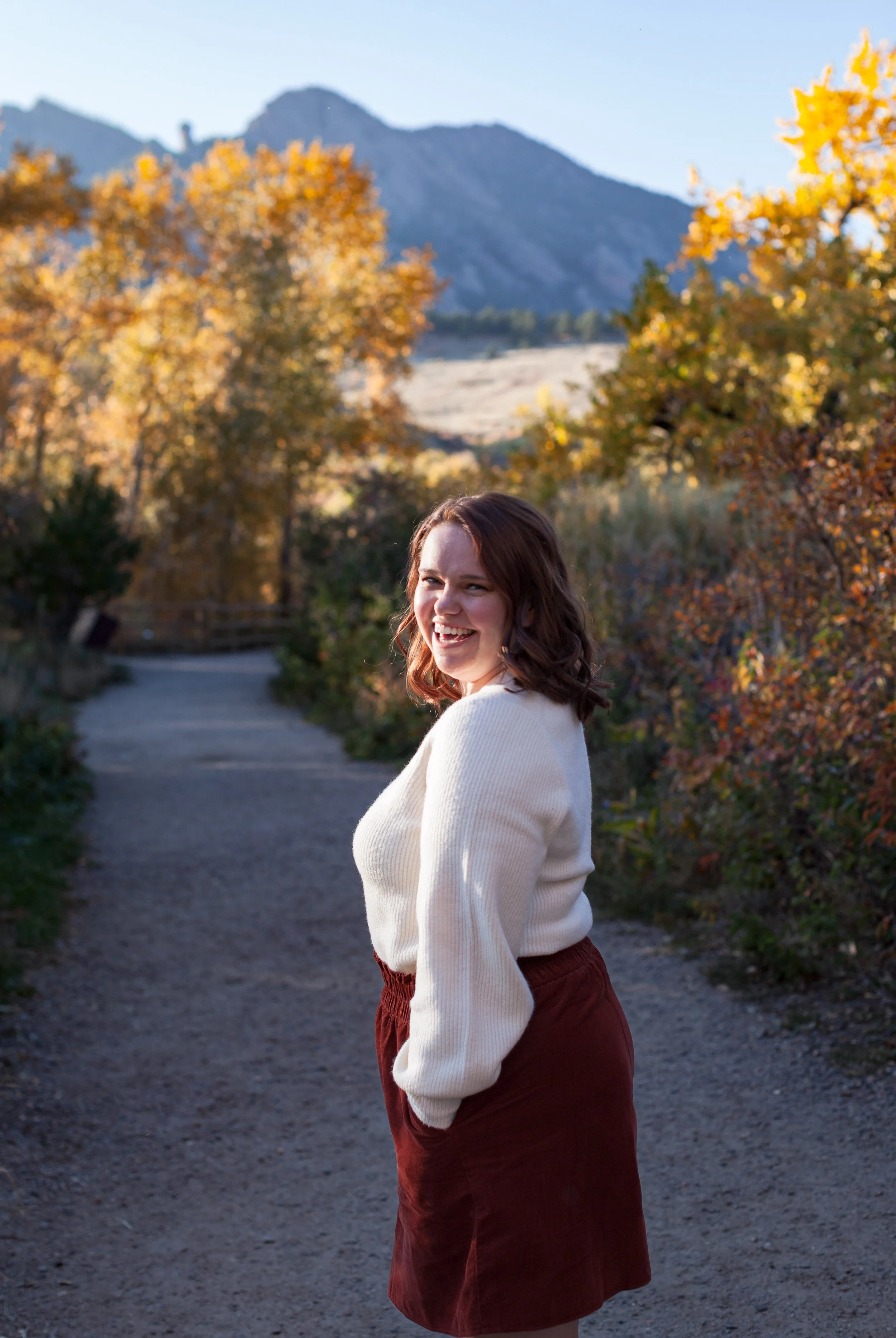 woman flatirons colorado portrait fall