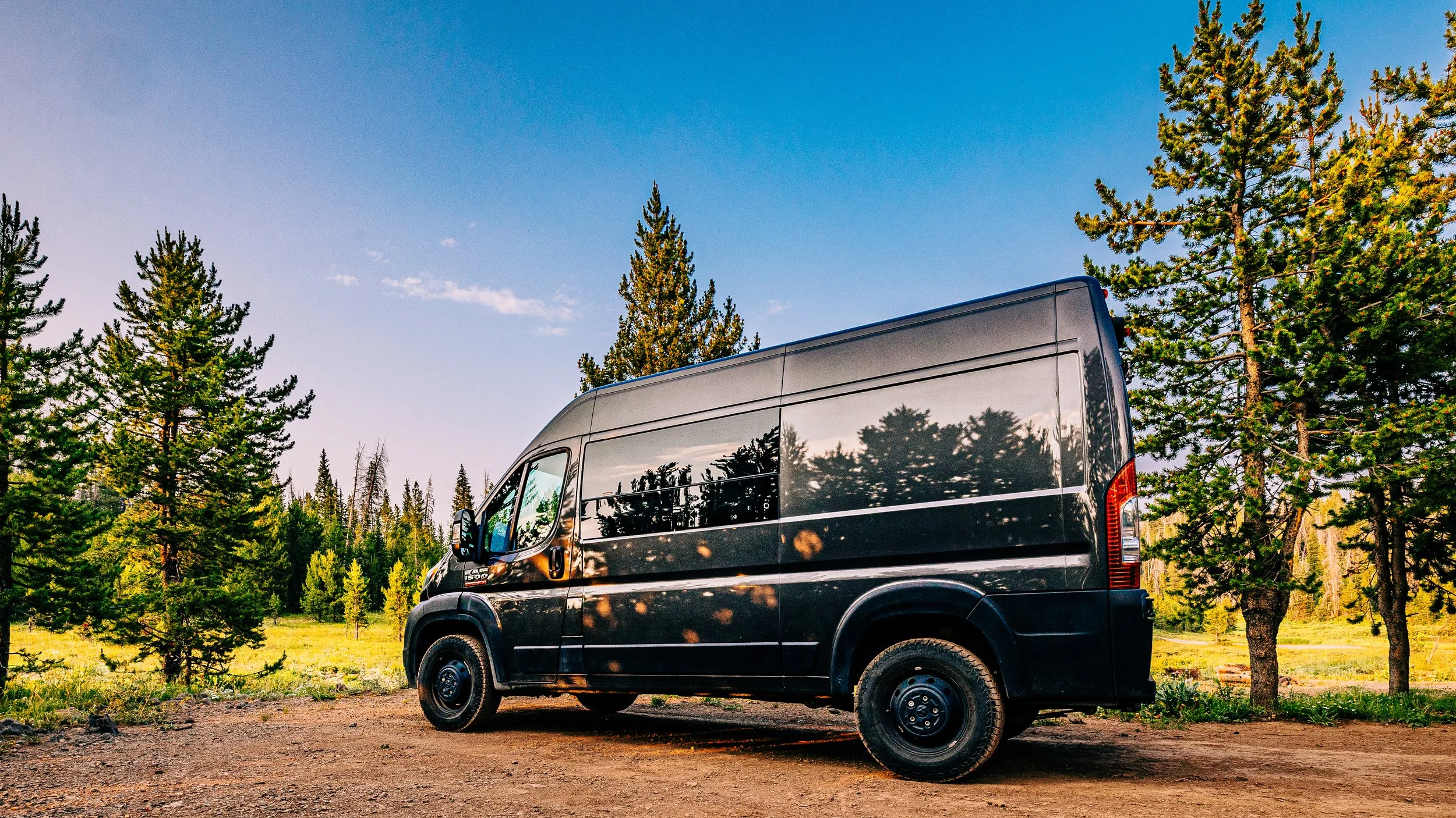 steamboat springs sunset with campervan in summer