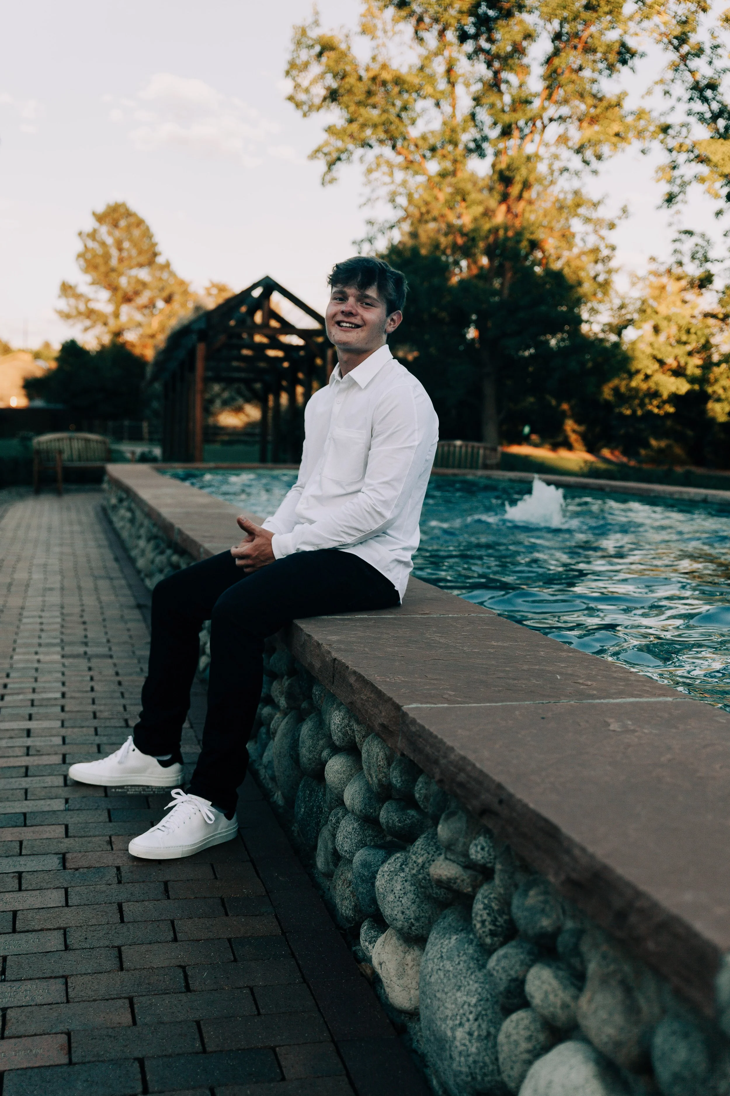 young man senior photos colorado hudson gardens