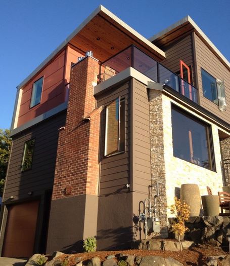 These clients love their modern home. They asked for a traditional house.