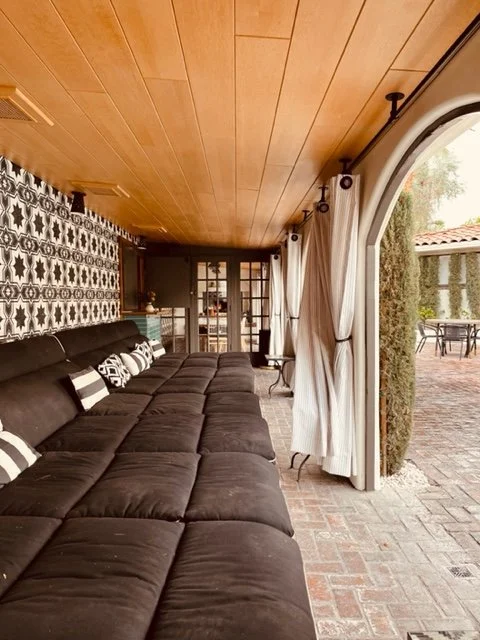This colonnade creates a space that is outdoors AND indoors.