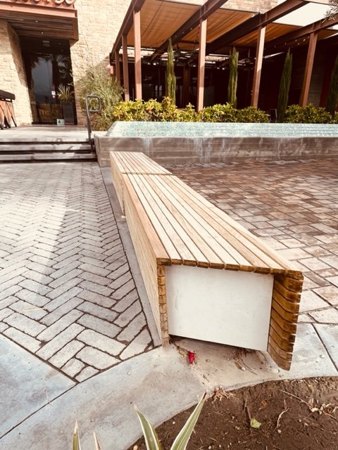 This cool bench also creates a nice separation to an outdoor dining area