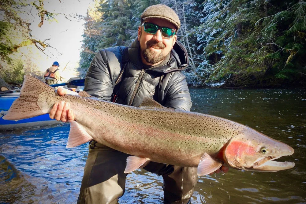 Lead Guide Josh Temple with a beauty Steelhead