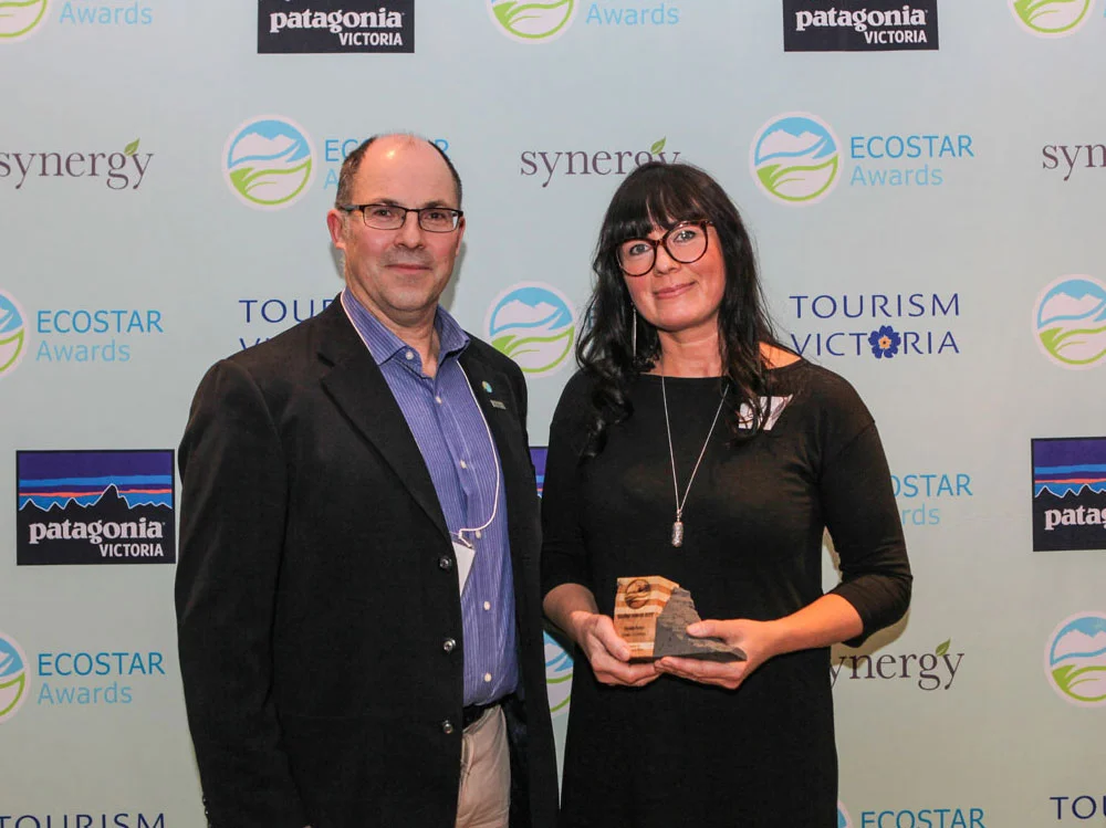 Ocean Outfitters General Manager receiving an Ecostar Award.