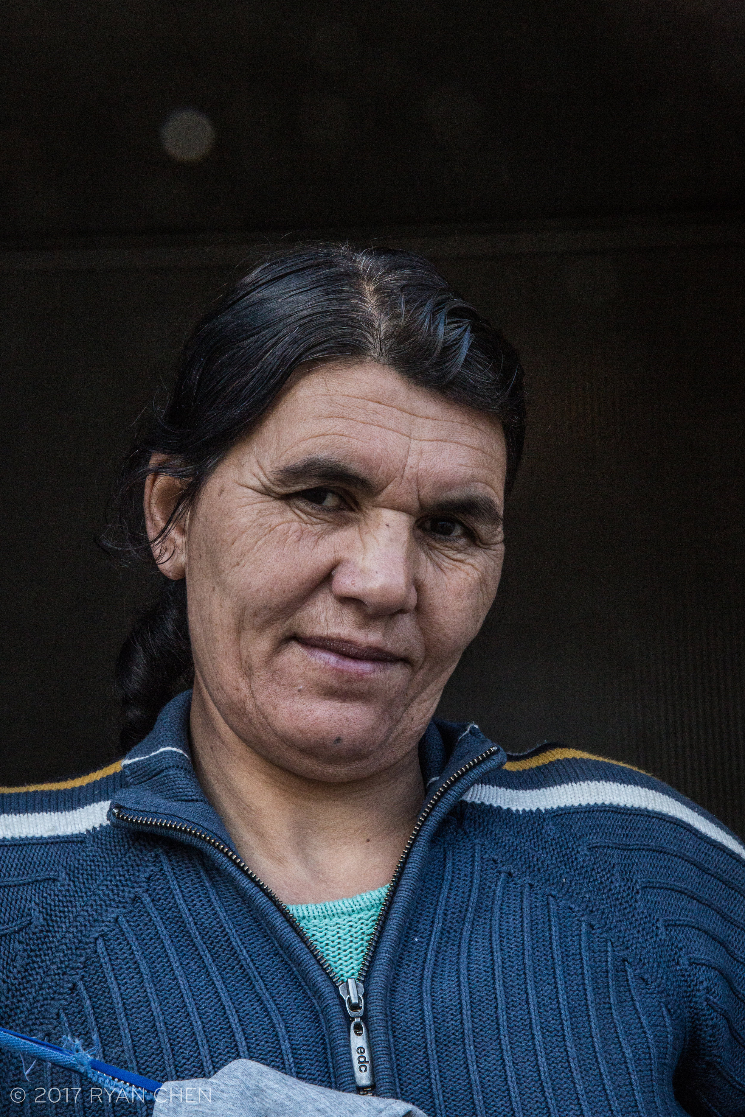 Kooshi, a Yazidid woman lives in Larida camp on Laros Island with her three sons. Her husband was killed in Iraq.