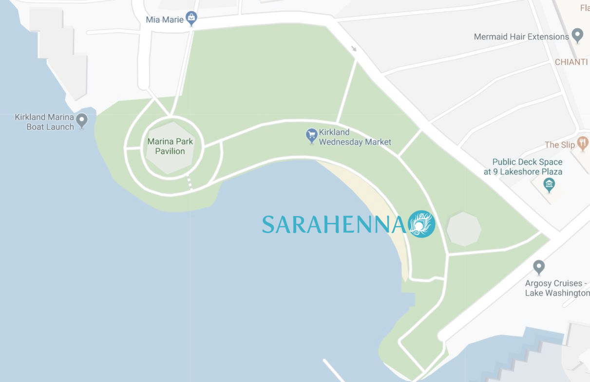 We’re right next to the restrooms on the grass at Marina Park, near the water!
