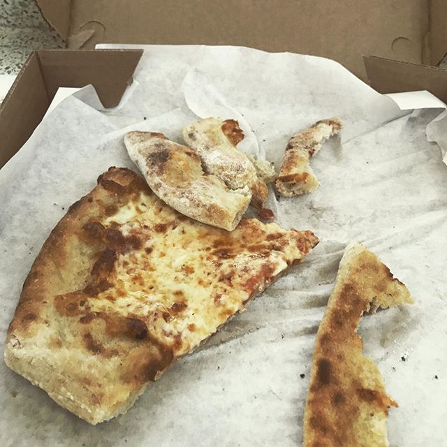 Devouring that LGO Pizza before flying to Burbank.
