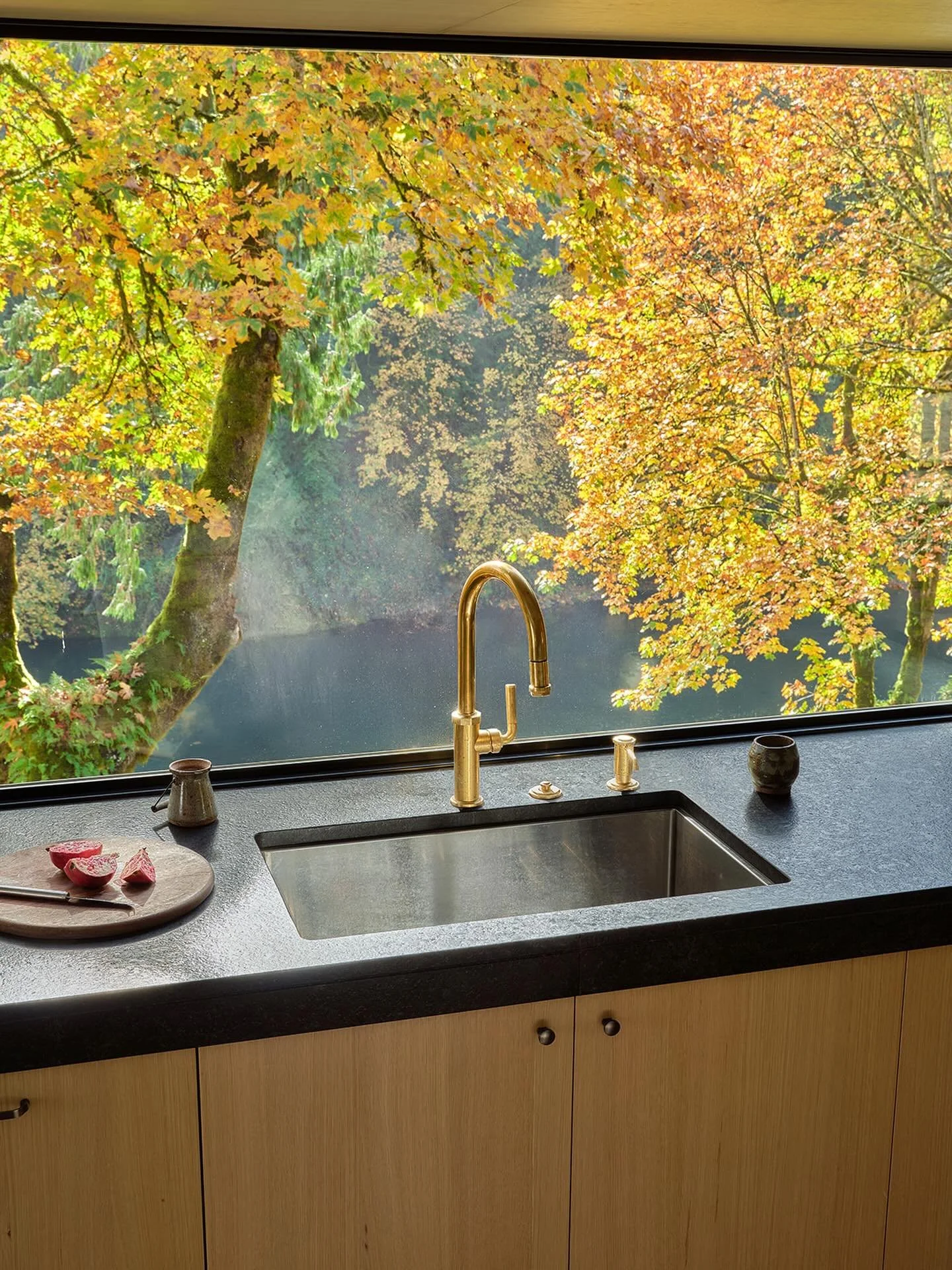 Positively glowing 🧡 An unconventional camera angle so you see what our client experiences when she&rsquo;s cooking.  The counter-to-ceiling window detail, a result of detailed drawings and numerous site meetings, further blurs the barrier to the ou