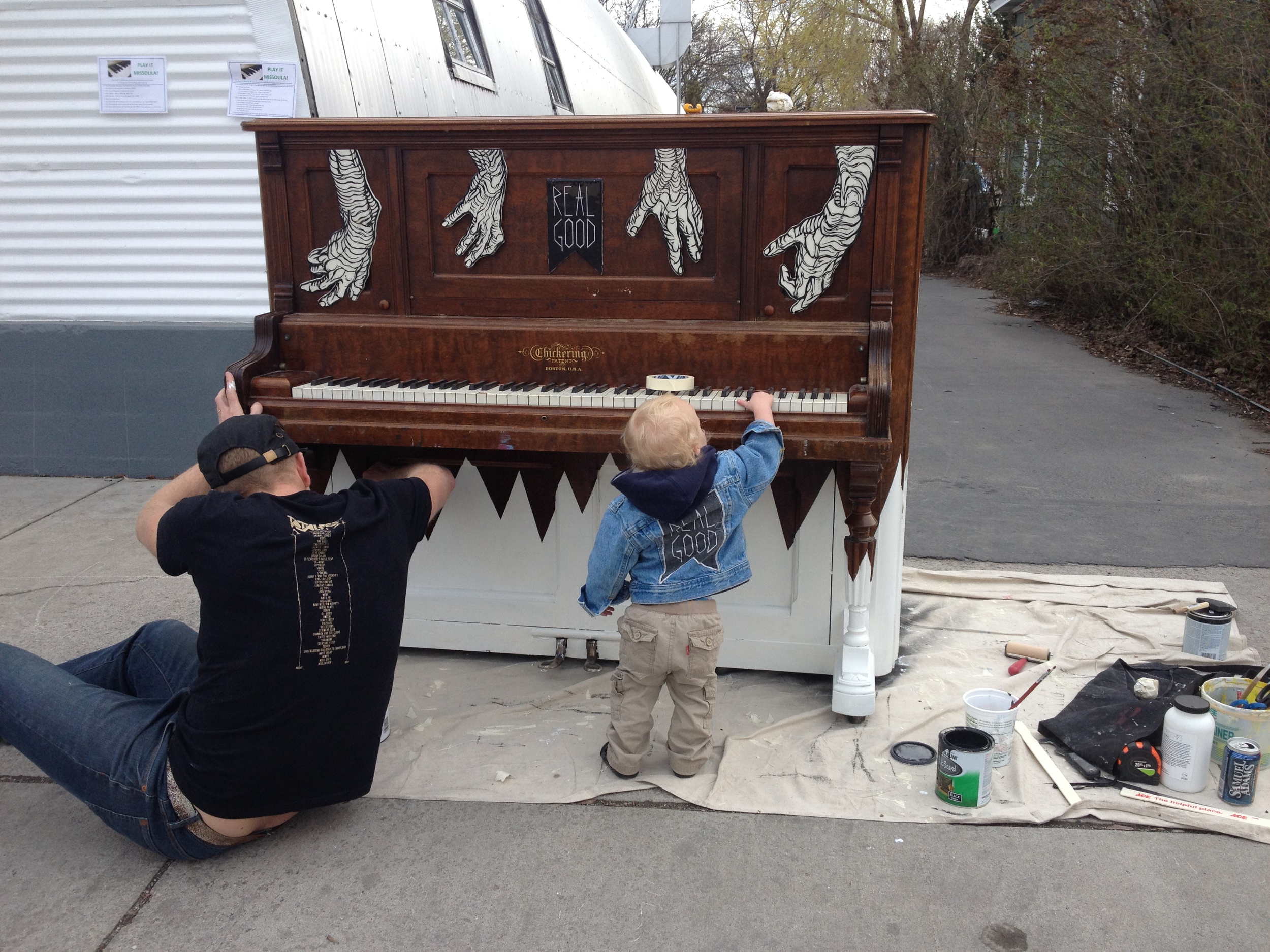The Metcalf's playing on a piano.