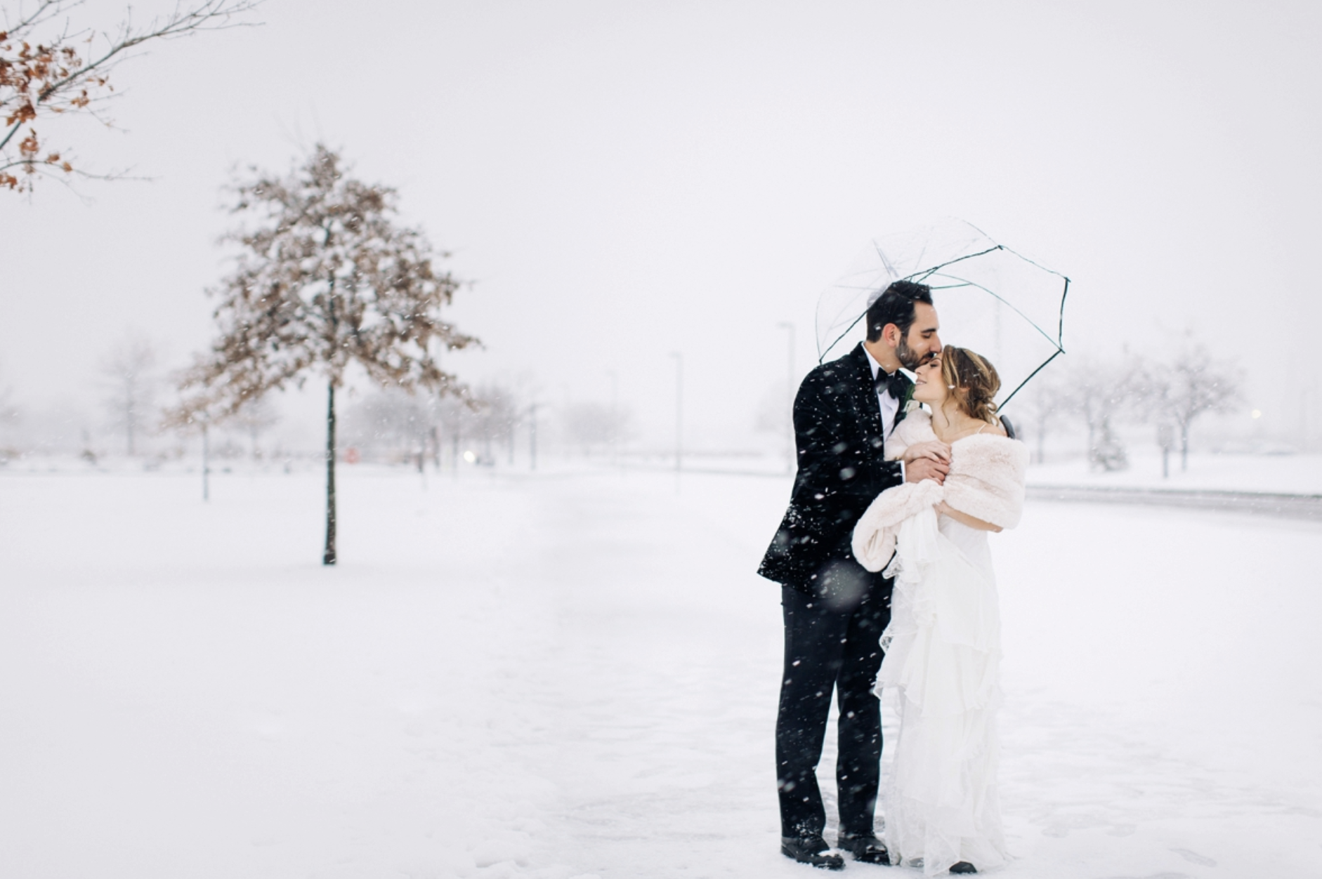 "Somehow I have to explain the amazingness that is Richard and Andrea in 3500 characters! Choosing to have Richard and Andrea photograph our December wedding was hands down the best decision we made in the wedding process. From the very beginning they were true professionals whose passion for their business was very obvious. They made my husband and I feel very comfortable by going over all details of the different packages and even giving us a sample of a timeline for the actual wedding day. We knew that we would be working with two people who understood how important this day was to us and would be true partners during the process. As the wedding day got closer, I was getting really stressed about logistics and timing. Any time I had a question, Richard was on the phone going through all details with me and assuring me that everything would be fine. He was so organized that it put me at ease and let me focus on other things. I had full confidence in him and Andrea. What initially drew me to Richard when I was looking for photographers was his crisp and clean photos - no gimmicks with filters or overly artsy shots. They were pure pictures from couples' weddings. I can say with confidence that our pictures really captured who we are and the beauty of the day. It snowed on our wedding day and Richard and Andrea were more than game to go outside and take some shots of us. The outcome of the photos was absolutely stunning. Richard and Andrea have great energy and compliment each other's work styles. They were really fun to work with the day of our wedding. Another fantastic perk - Andrea is a makeup artist and a dang good one! She did my makeup for my wedding and it was really great having her there all day to do touch ups (it's a really nice thing to have especially after the champagne starts to flow :) ) We did a trial for our engagement shoot and she really listened to what my vision was. I couldn't have been happier with the outcome. Oh - and she was 7 months pregnant at our wedding and was a badass the entire day. I will for sure recommend Richard and Andrea to all of my friends and if you're reading this - BOOK THEM ASAP! And definitely do an Engagement Shoot! You get to know Richard and Andrea (who are really cool people!) and it gets you and your partner prepped for the big day." -ToniAnne