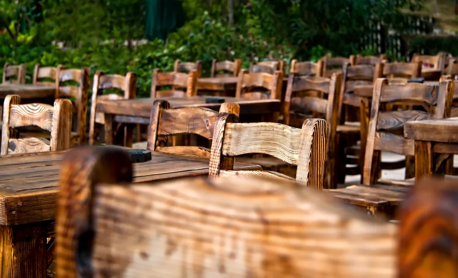 stockfresh_2406329_empty-wooden-chairs-and-tables_sizeS_b74345.jpg