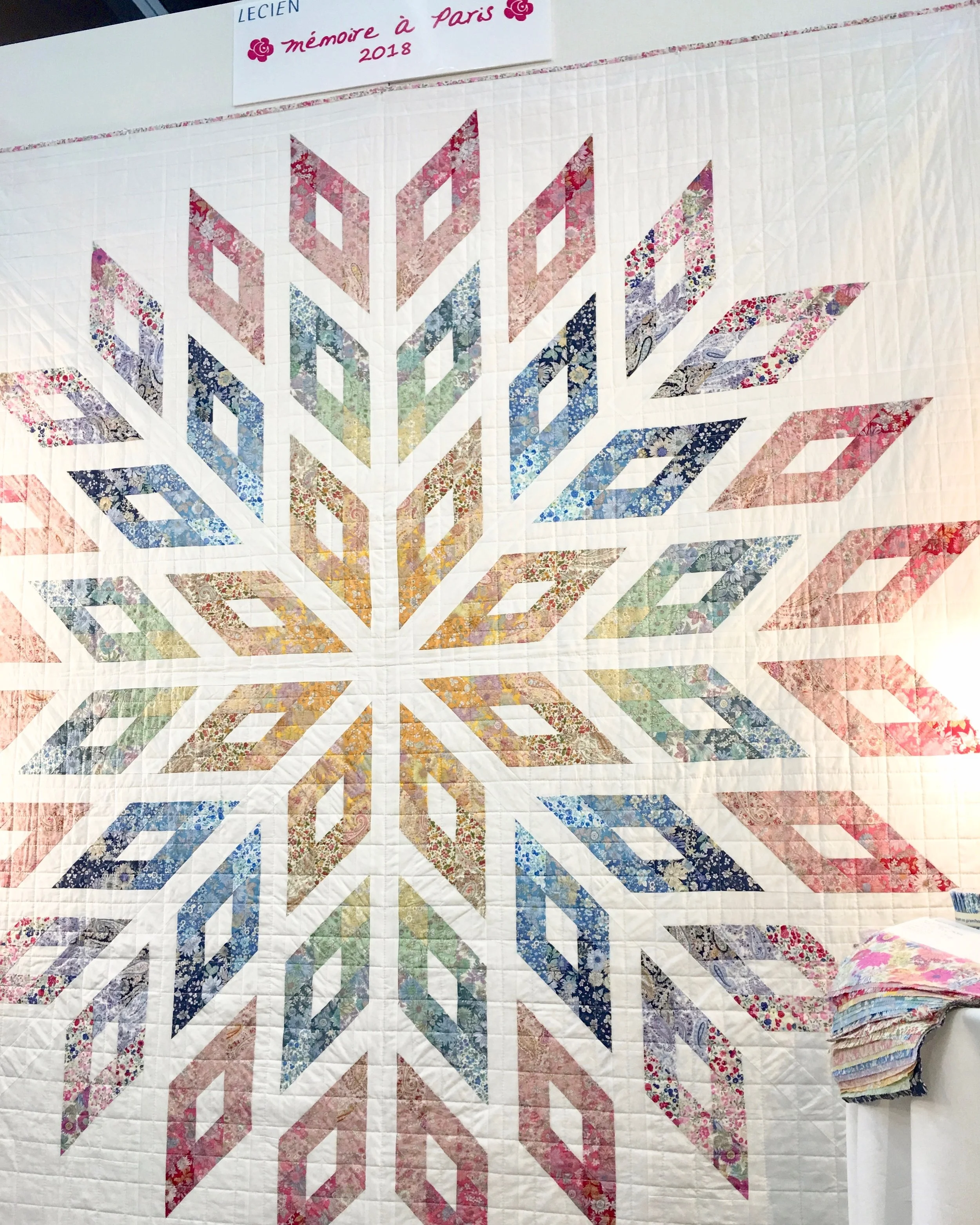The 2018 “Memoire a Paris” Lone Star Quilt designed, created, & quilted by Lynne Goldsworthy - displayed in Portland at Spring Quilt Market 2018