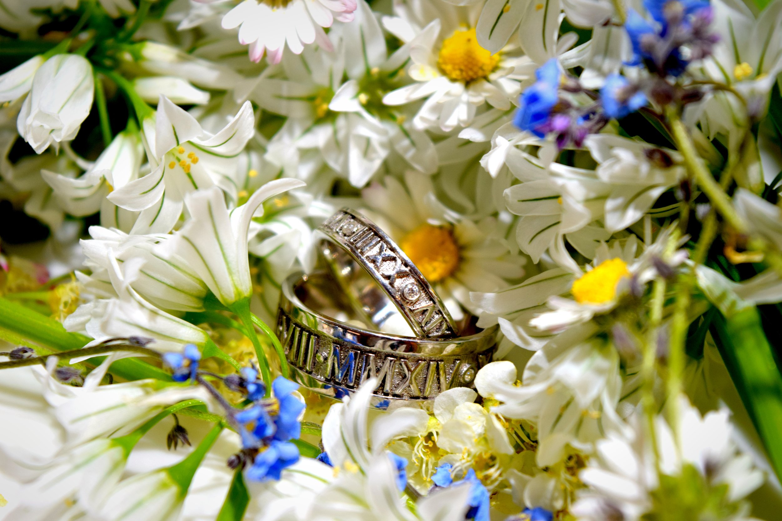 Wedding bands in flowers