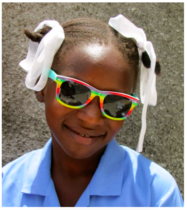 (Sweet Lovena – one of our darling students – Lovena’s mother died in March 2013, so her father has sent her to live with her aunt and one cousin. Her seven sisters and two brothers remain with her father in the countryside.)