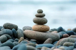 stacked-stones-on-lots-of-small-rocks-300x199.jpg