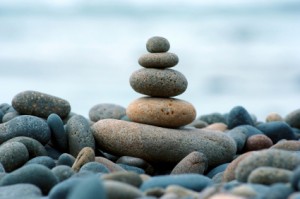 stacked-stones-on-lots-of-small-rocks-300x199.jpg