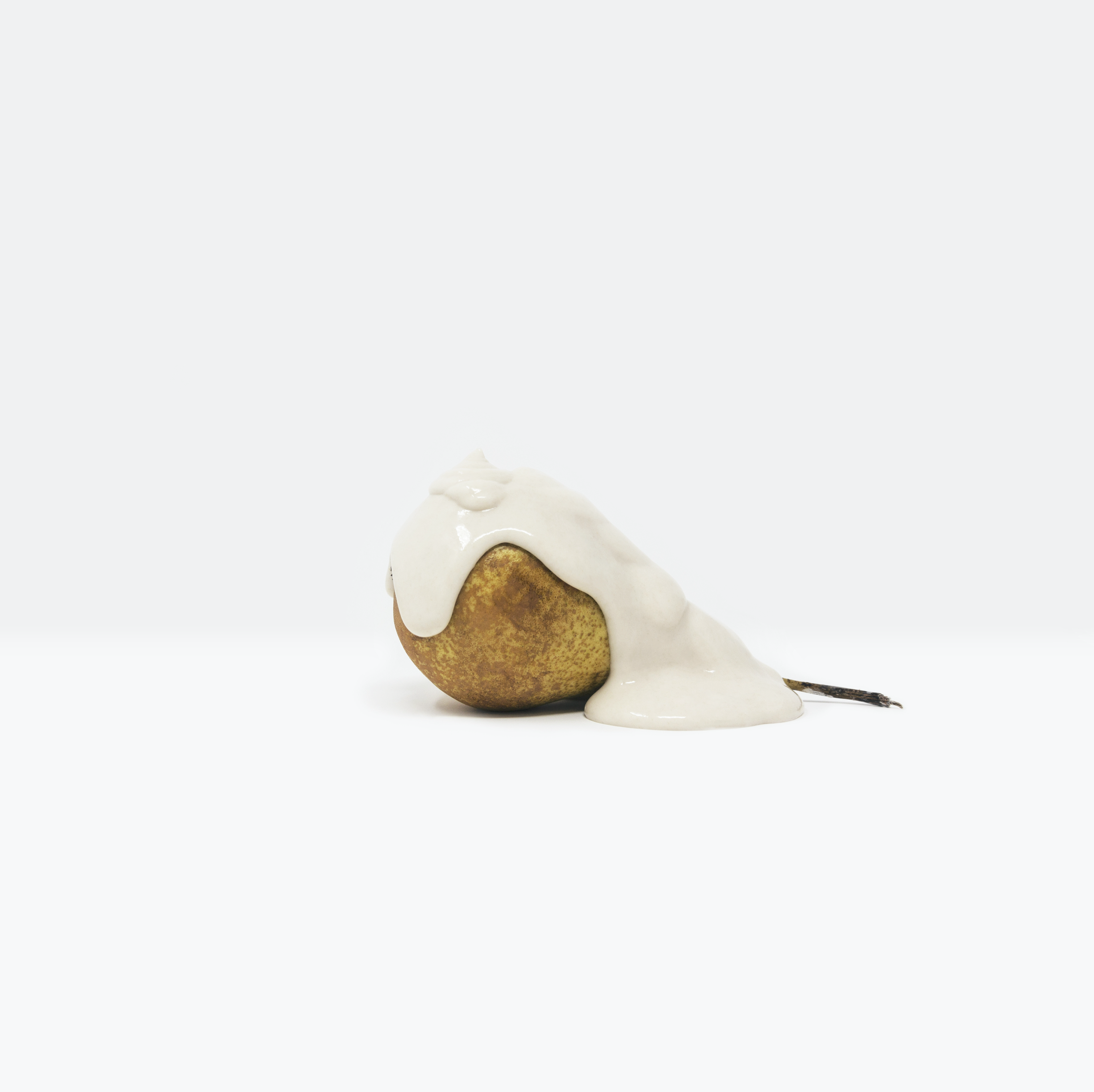 Minimalist, still life photograph of a piece of fruit covered in a paint-like substance highlighting the value of food, evoking the crucial reflection of the Global Food Crisis