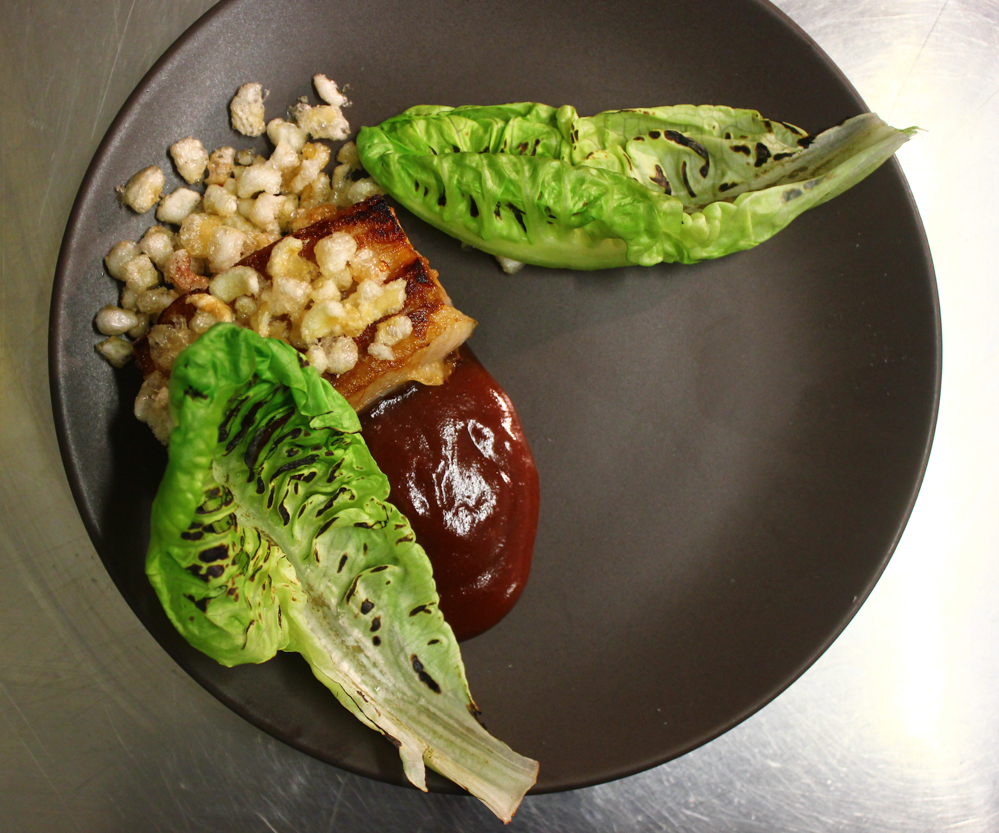 Pork belly, smoked plum sauce, grilled gem, puffed pork skin, angostura and aged vinegar