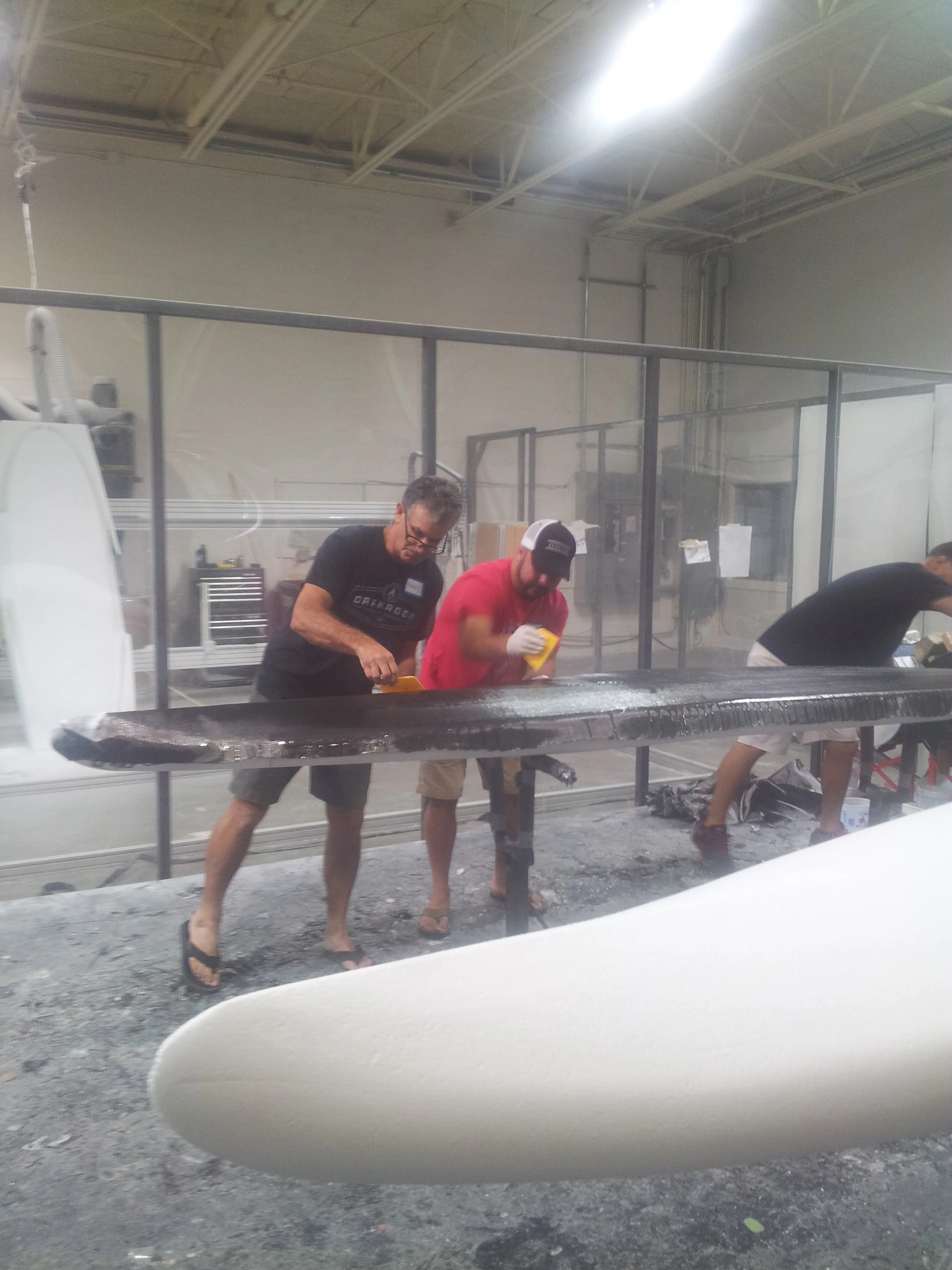 Abita Board Barn's Marc Frechou building a custom carbon race board at the Bote Darkroom