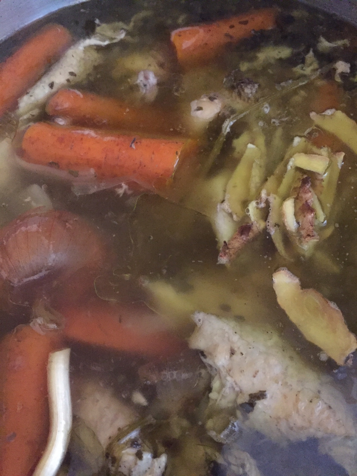 Simple chicken broth on the simmer.