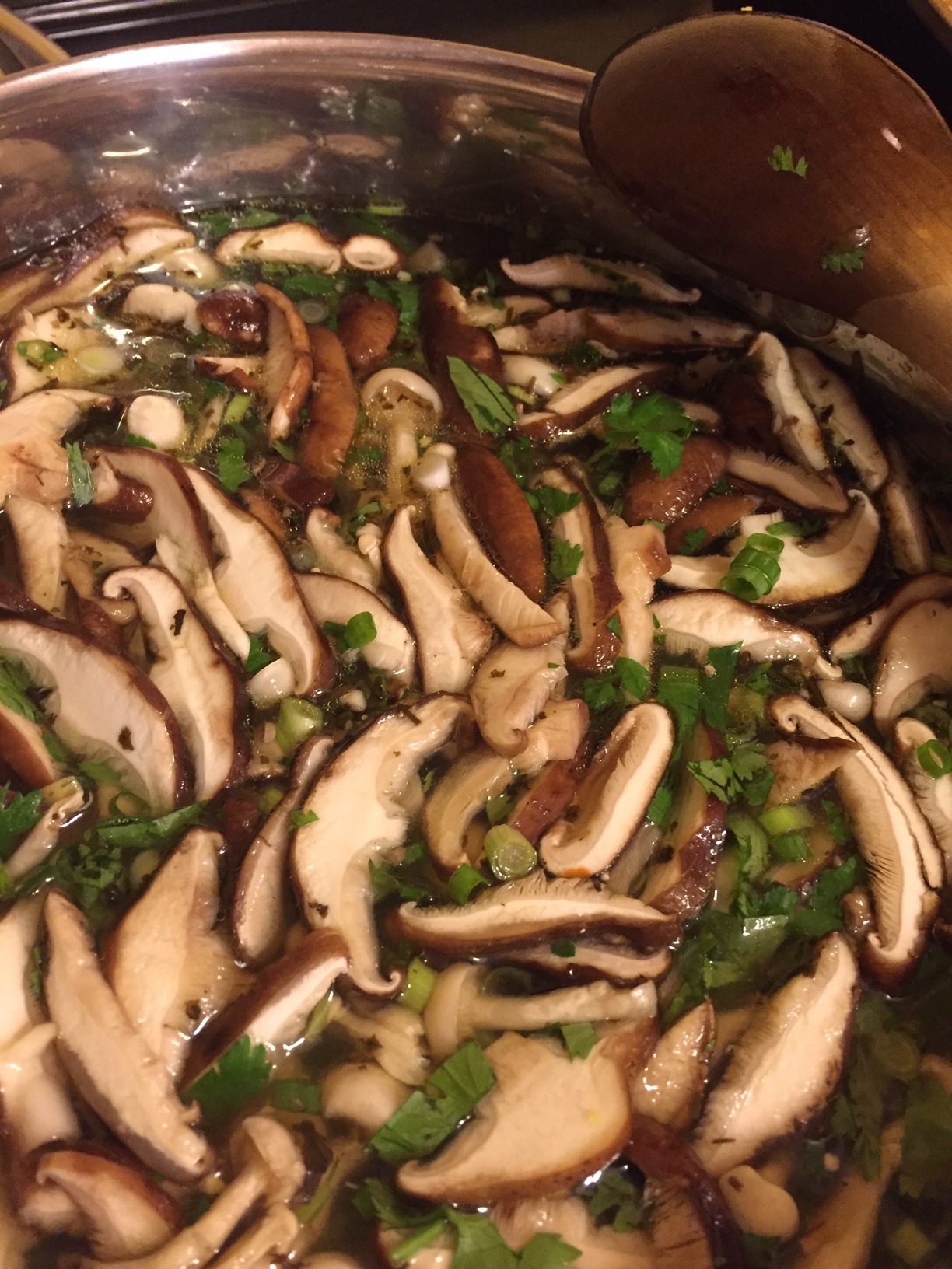 Shiitake + Bunapi Mushroom broth: Beef broth as a base, simmer the fresh mushrooms, garlic, ginger, green onions on top until desired level of tenderness. Great for cold weather!