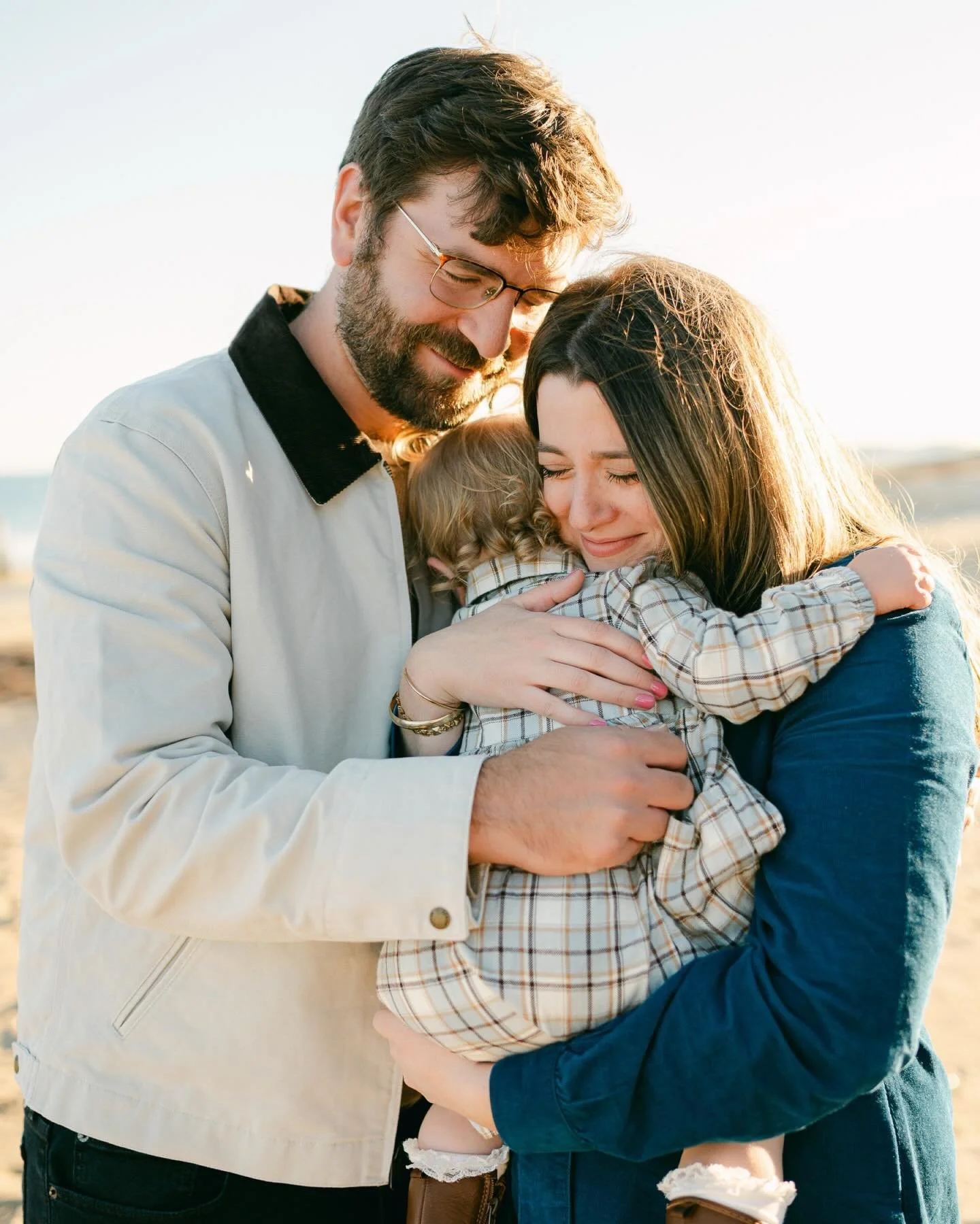 Now that those holiday cards have gone out, I would love to share some sessions from throughout the year. Starting with this sweet family beach session. You may notice that those sweet curls are hiding behind a blurred out face - that&rsquo;s because