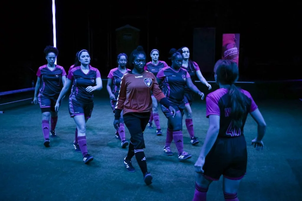 "The Wolves" by Sarah DeLappe —
PlayMakers Repertory Company, Chapel Hill, NC, 2025---
Set Design by Ant Ma
Lighting Design by Abigail Hoke-Brady 
Sound Design by Daniel Baker
Costume Design by Pam Bond
Stage Manager Aspen Jackson