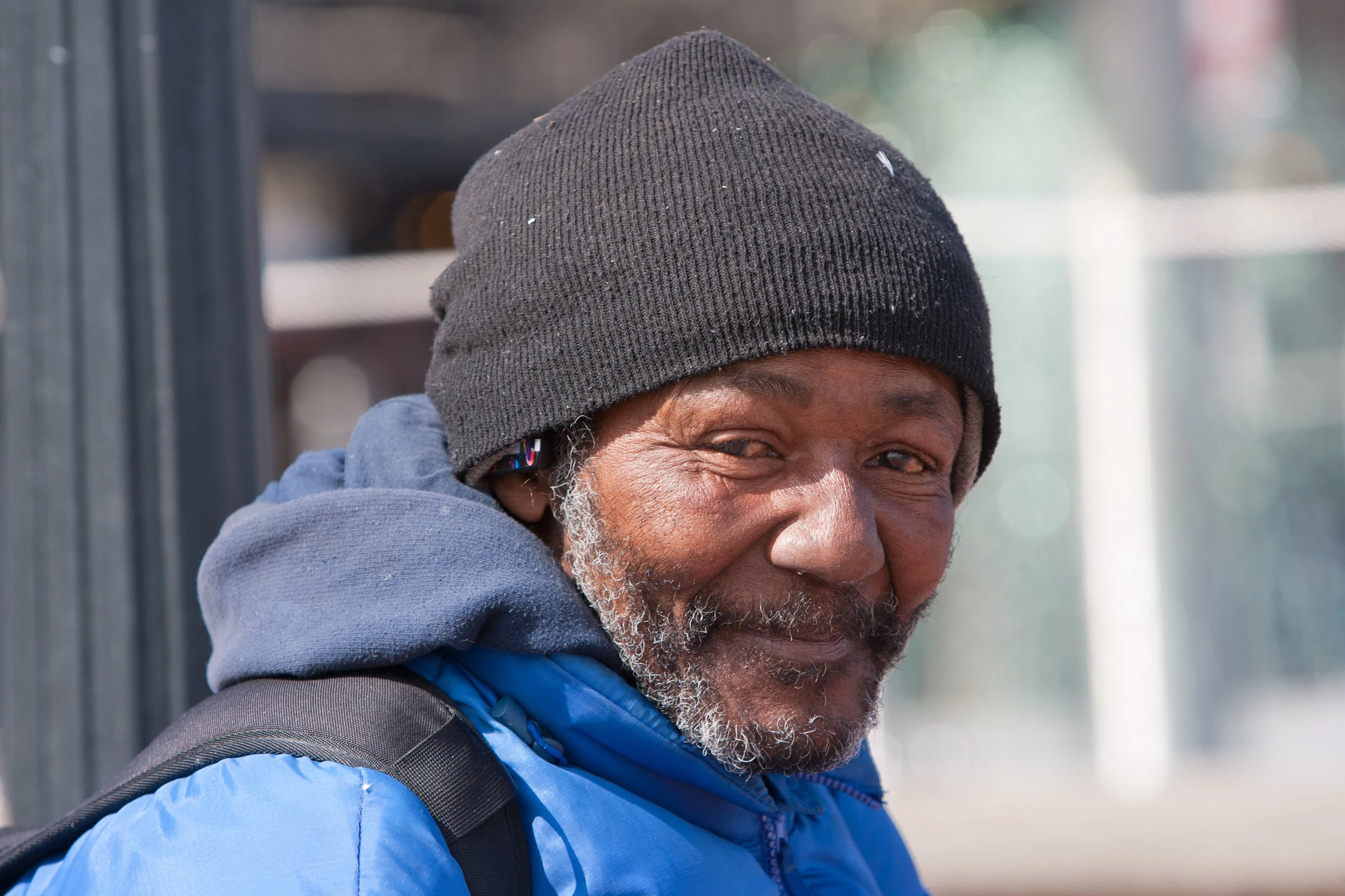 shutterstock_133077527 - black man with blue coat.jpg